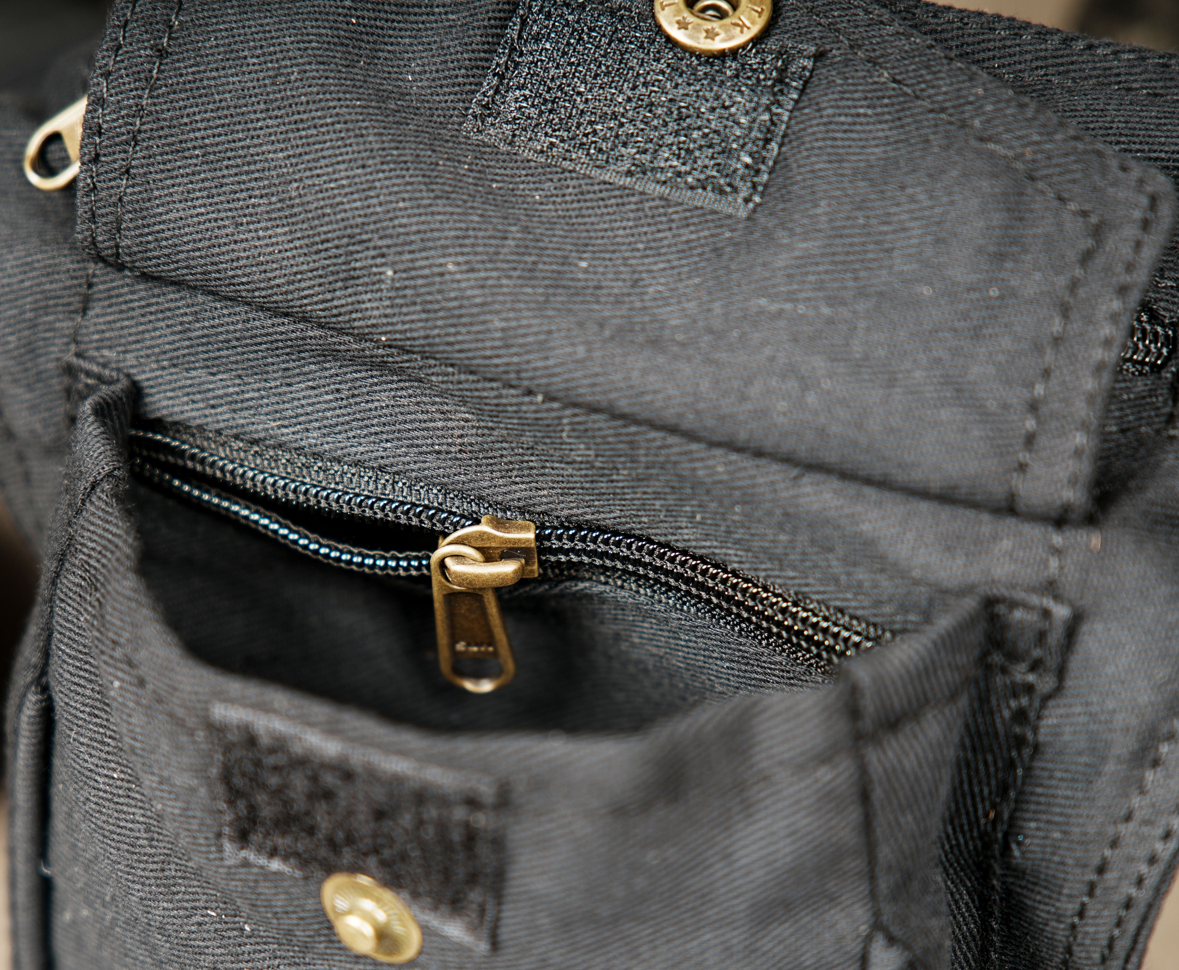 durable black canvas fanny pack for music festivals and concerts