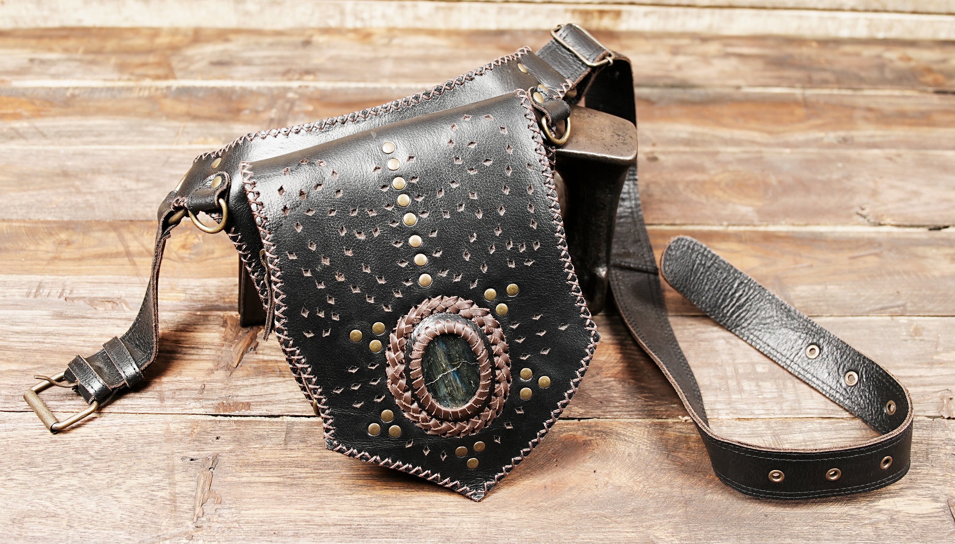 Leather waist belt pouch with adjustable strap and metal rings