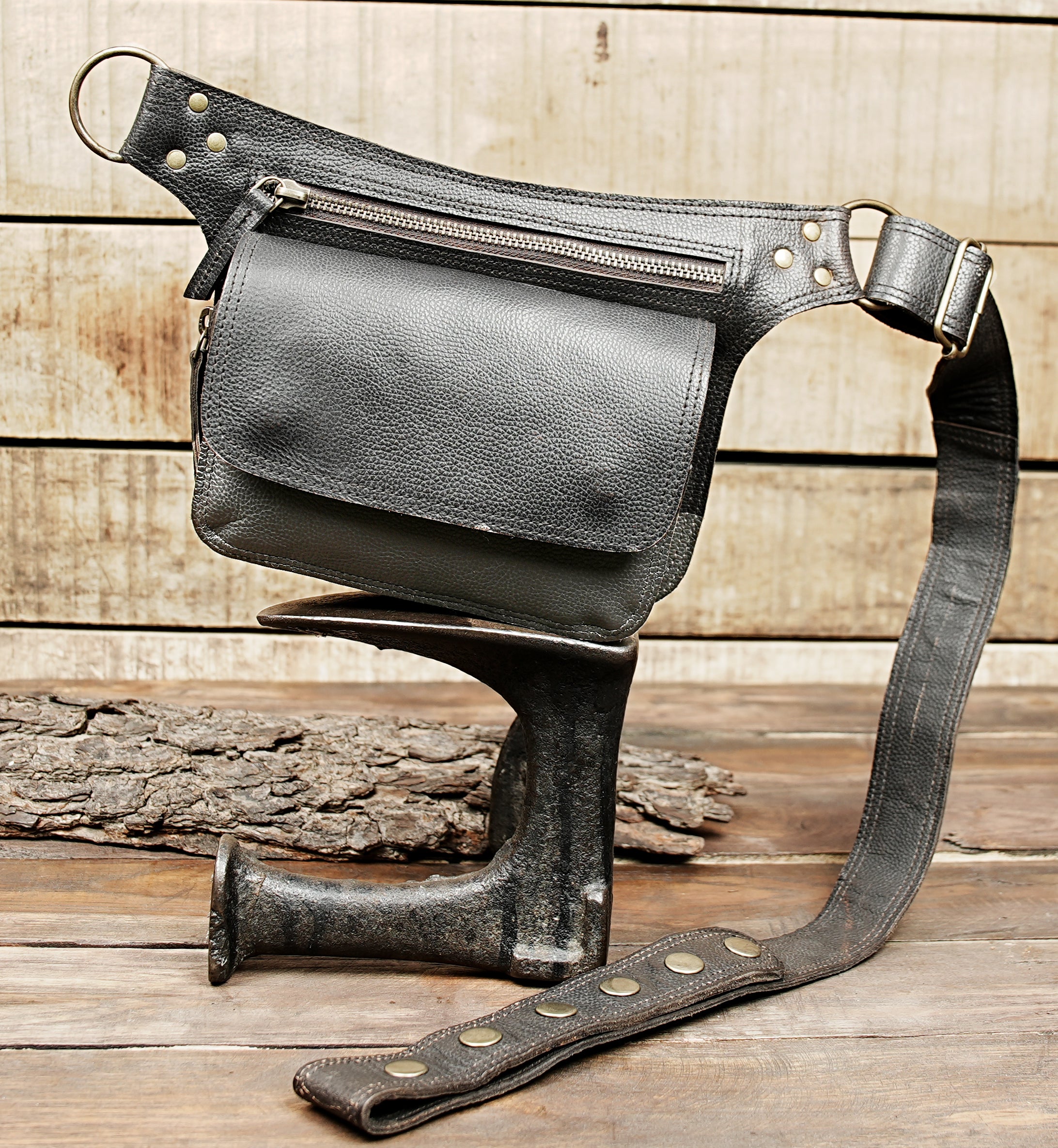 Back view of handmade leather hip bag with zipper pocket