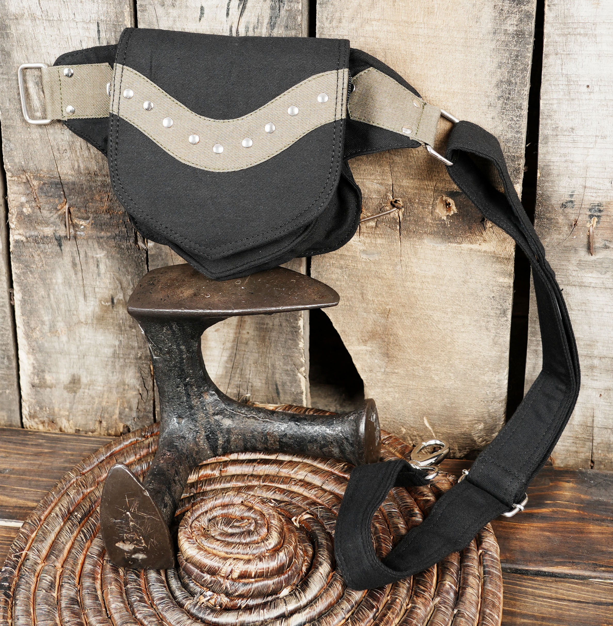 Bohemian style black fanny pack, combining rugged canvas with a unique handcrafted feel.
