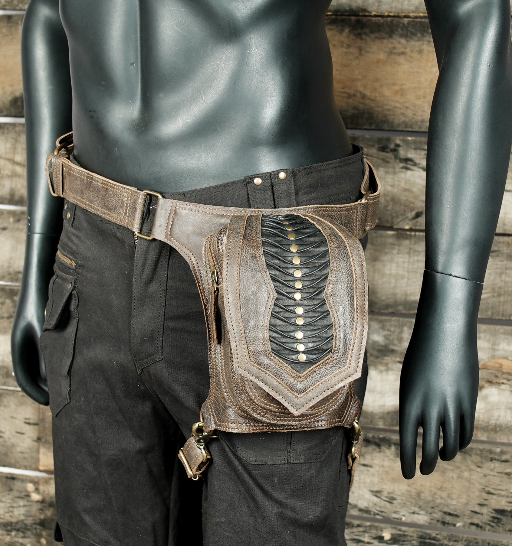 Leather thigh holster belt with reinforced hardware