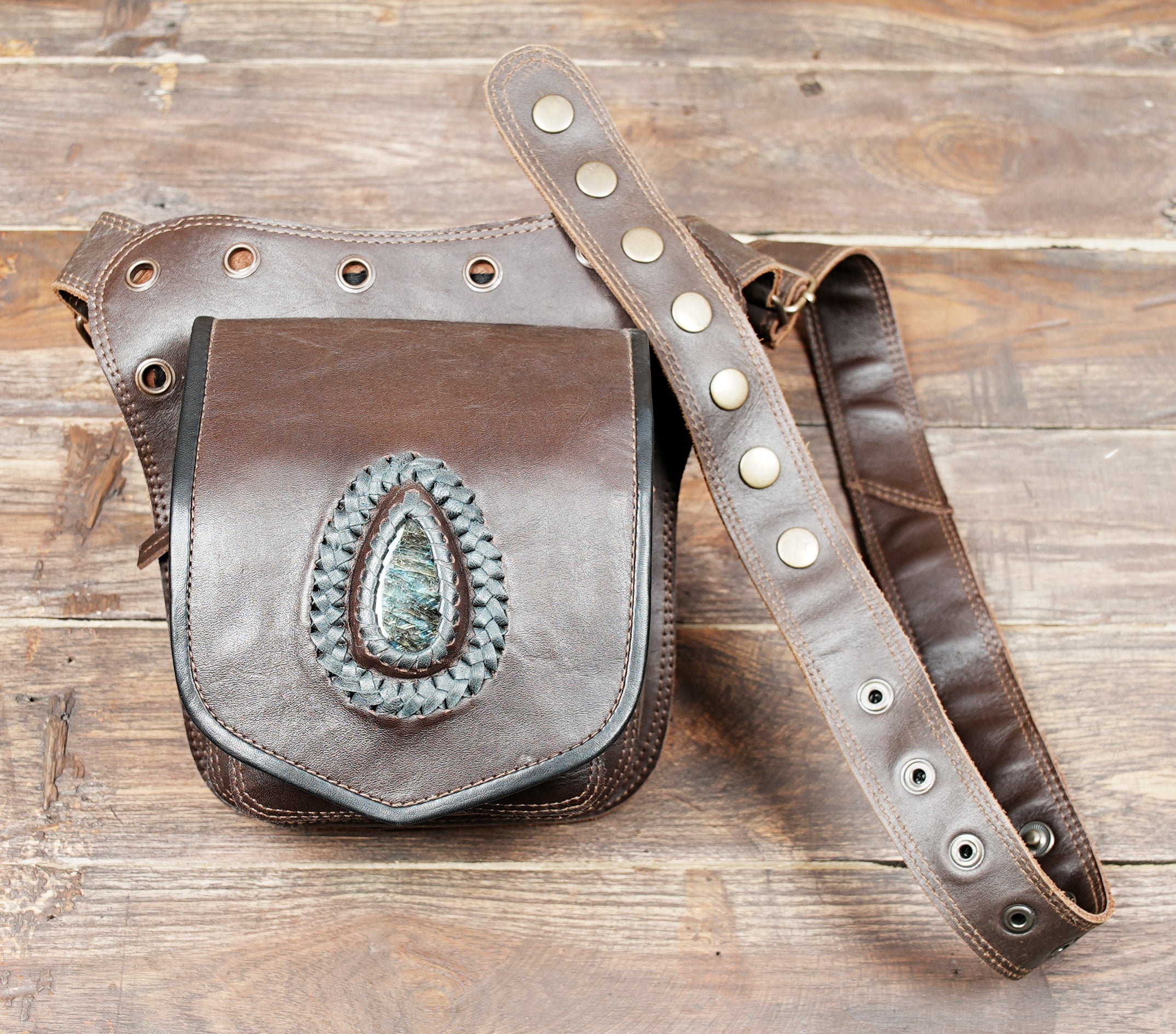 Brown leather utility belt bag with crystal centerpiece