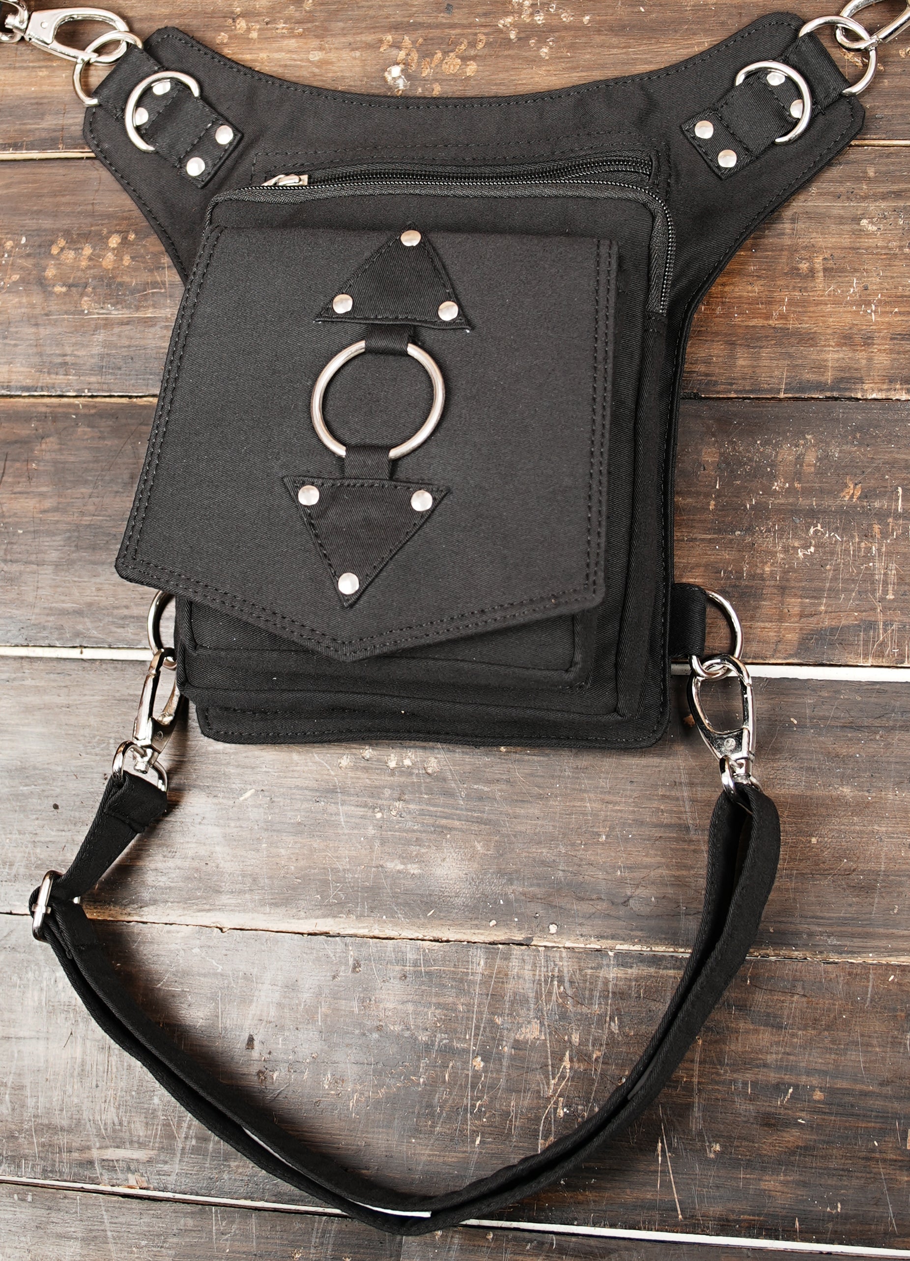 Black hip and thigh bag with adjustable belt for everyday carry essentials
