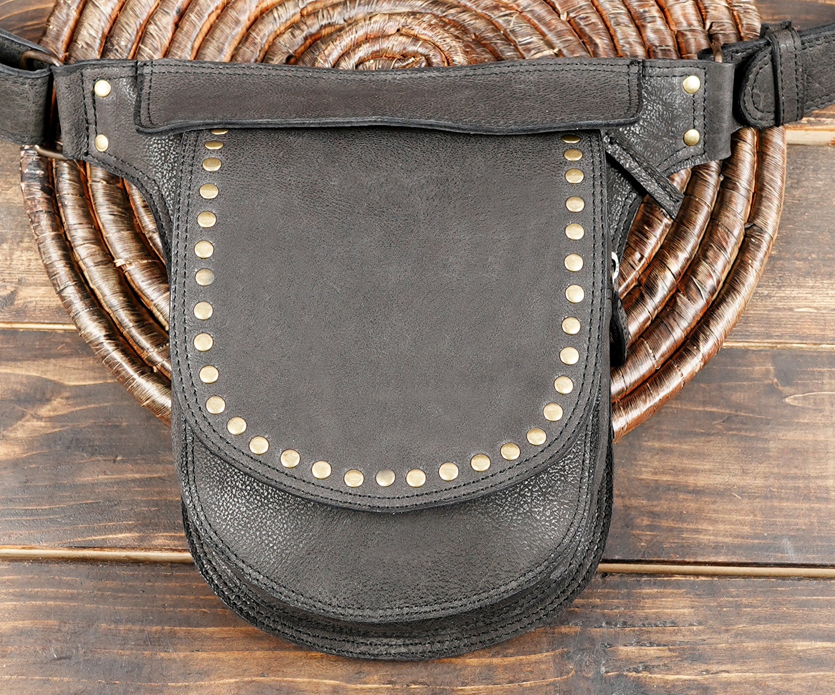 Handcrafted leather hip belt with simple stud accents
