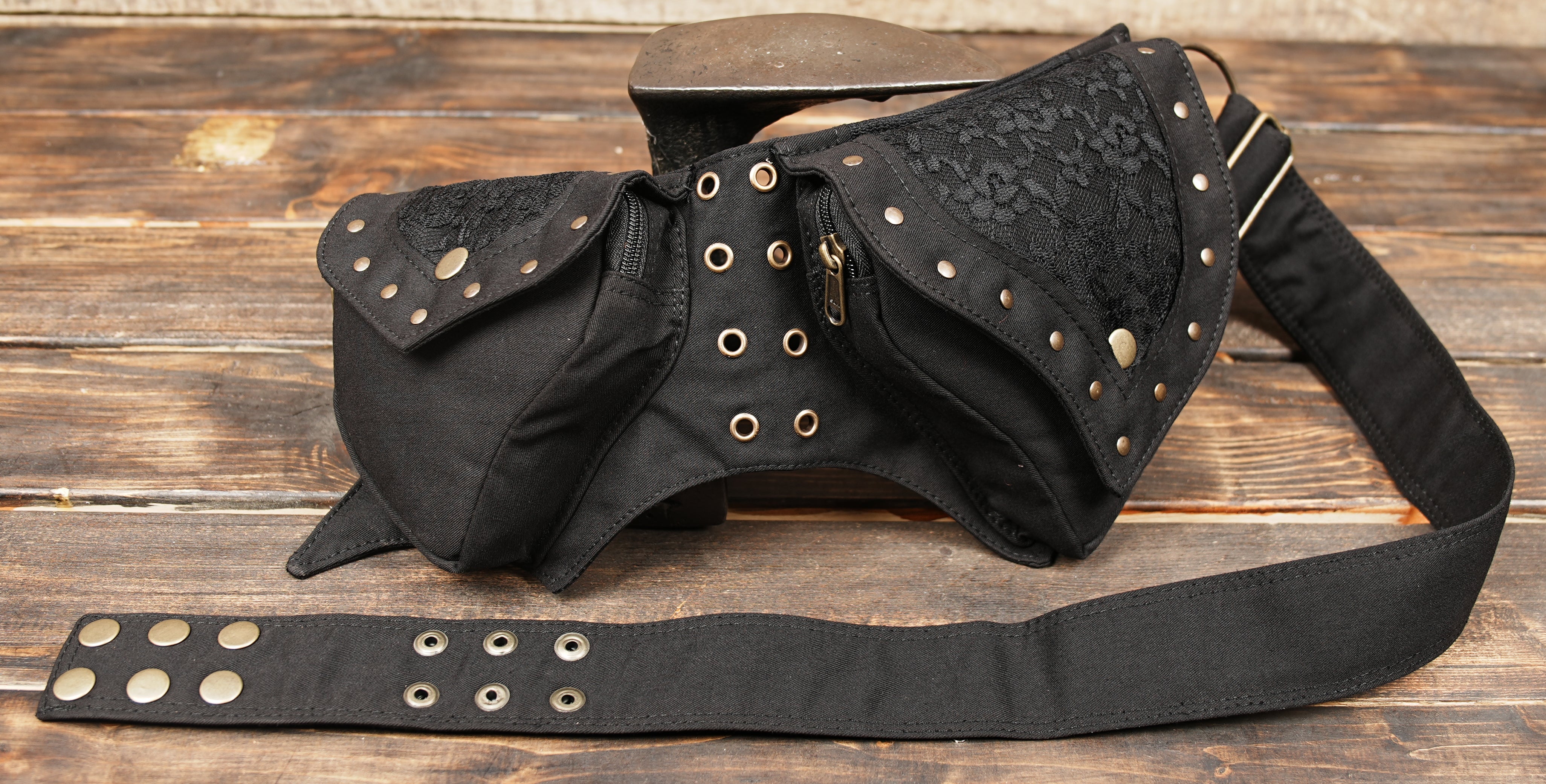 Close-up of rivet details on gothic utility waist pouch