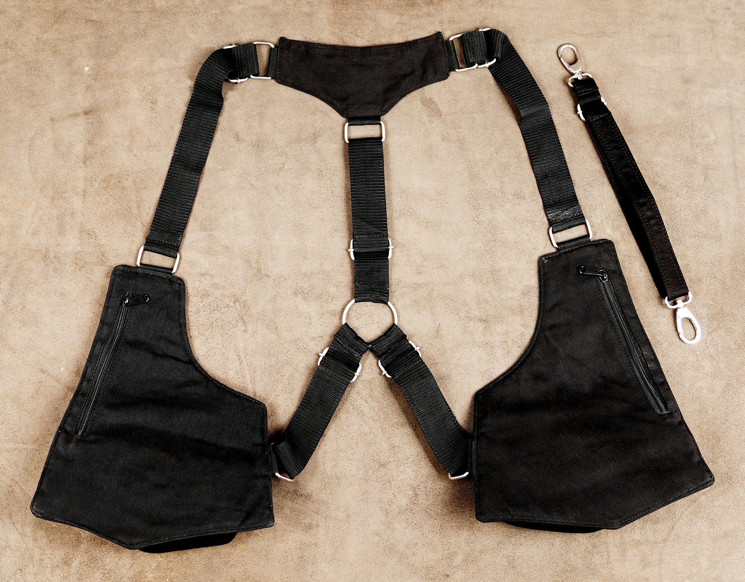 Body holster bag with metal ring buckle detail