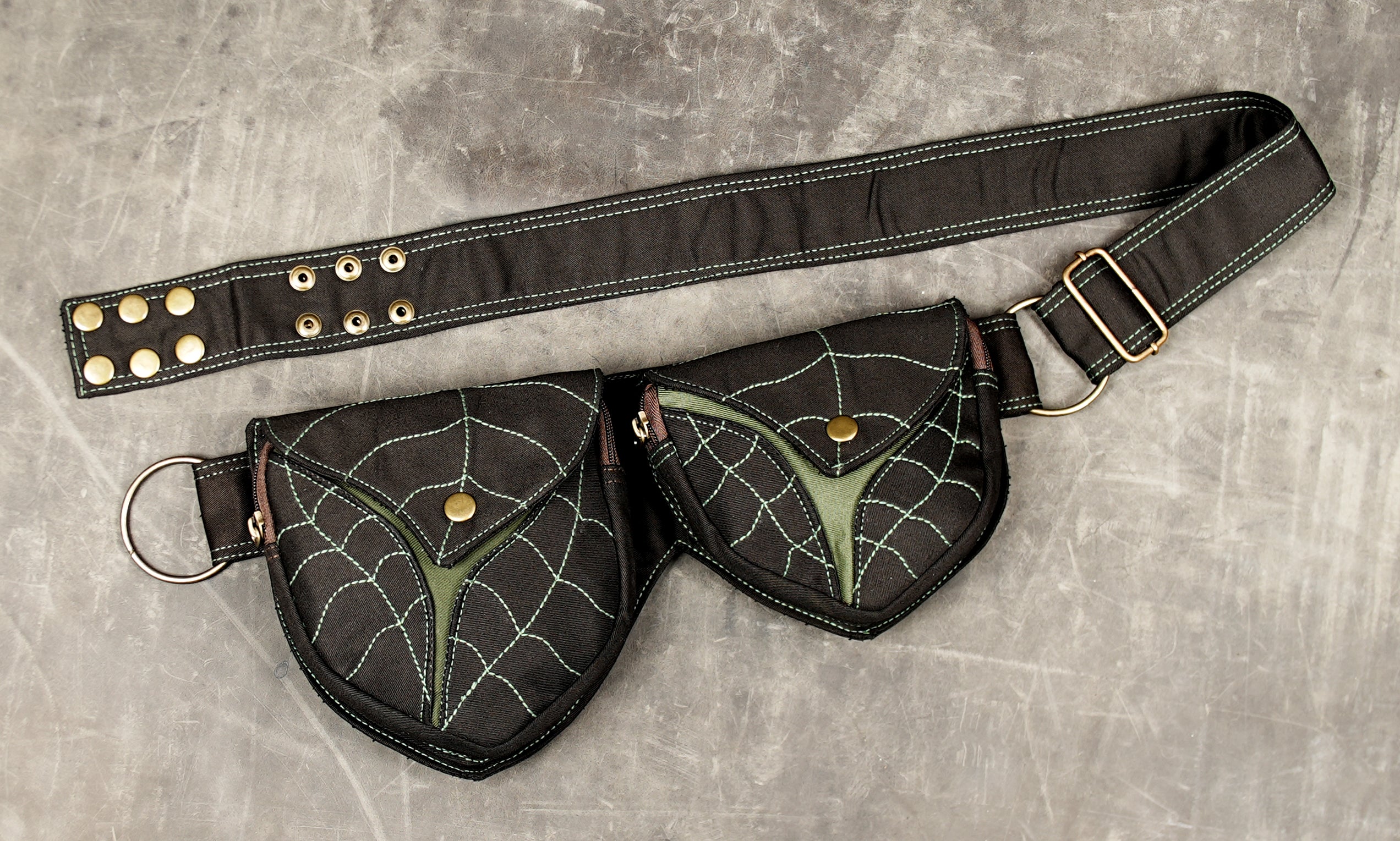 Burning Man utility belt in black cotton with two snap pouches and leaf vein pattern