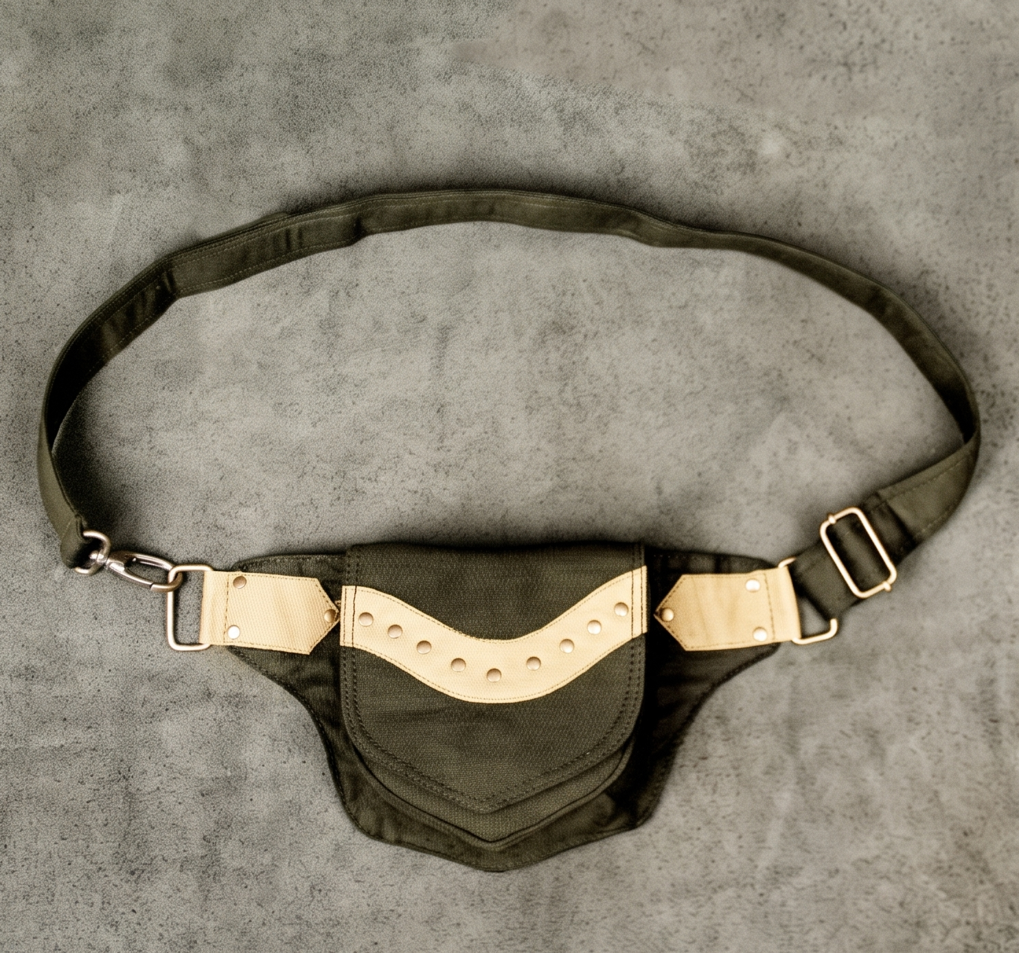 Cotton crossbody waist bag in black with olive green studded front