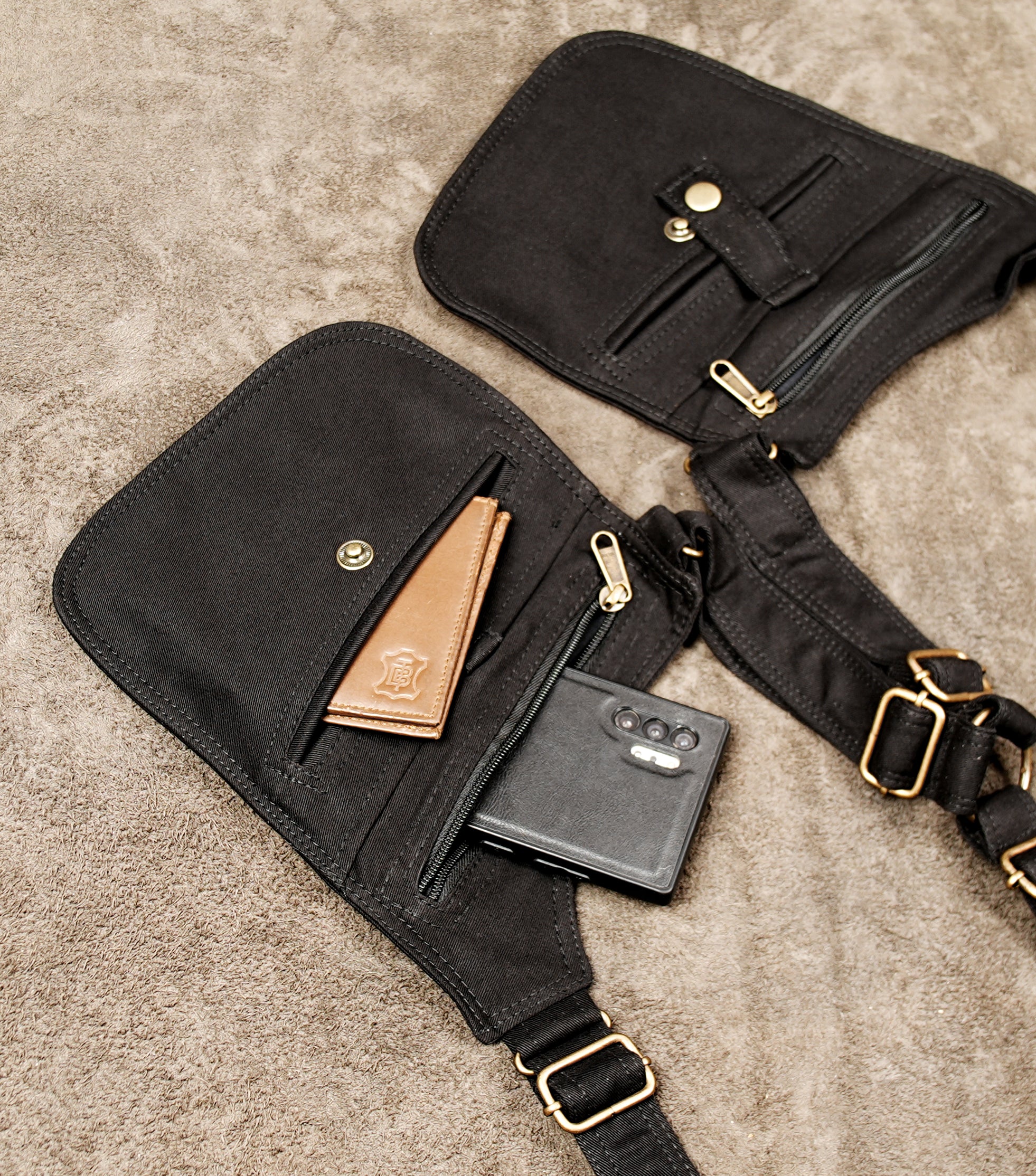 Adjustable black cotton underarm holster bag with two pouches