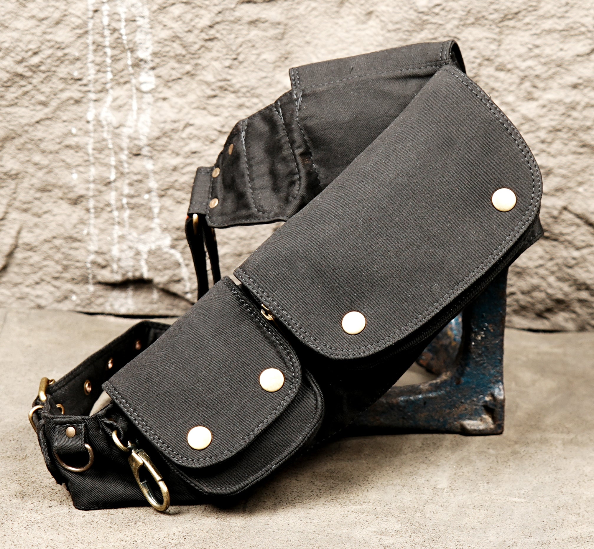 Black festival belt with zip and snap pockets for travel
