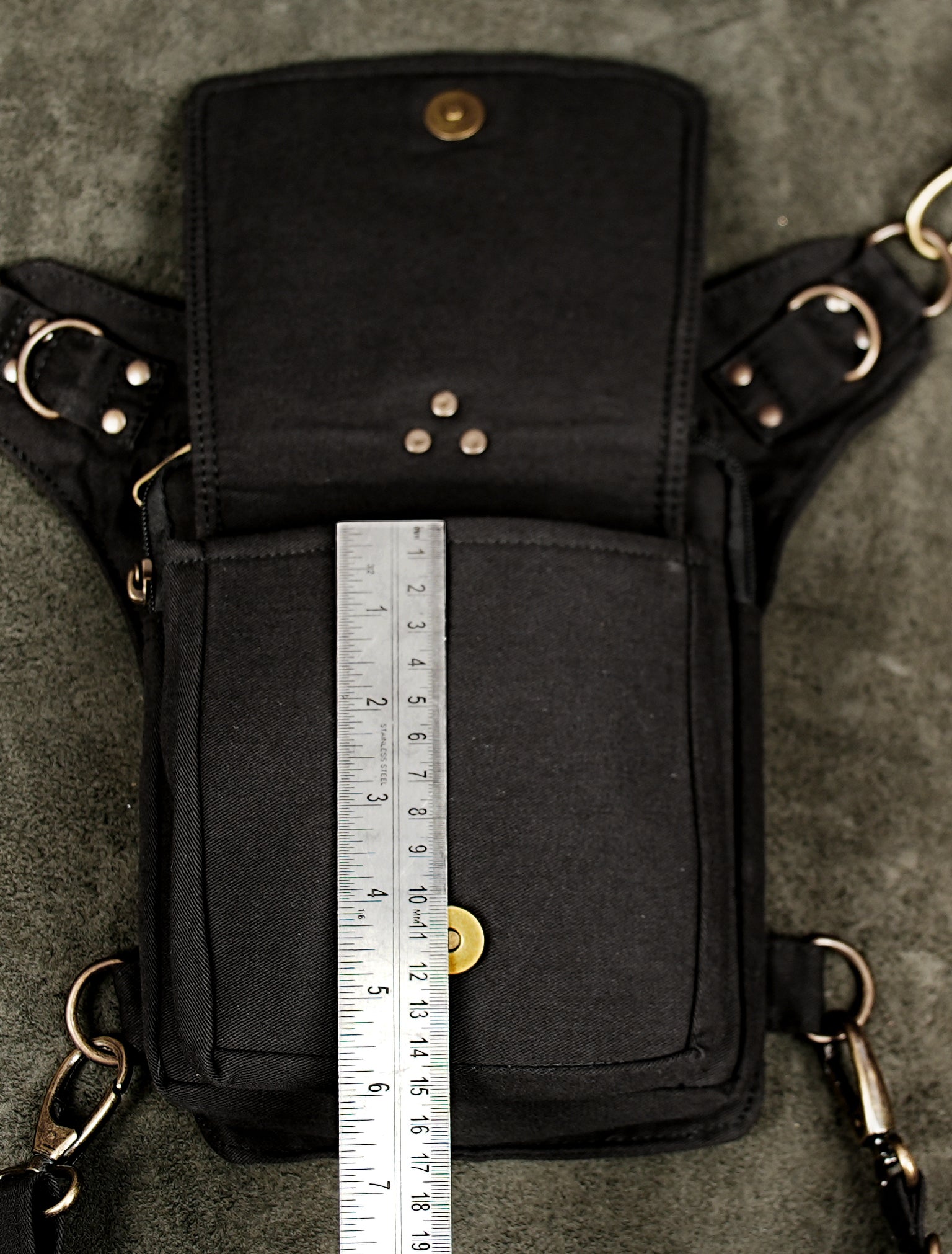 Black cotton hip belt bag with thigh strap and metal ring detailing