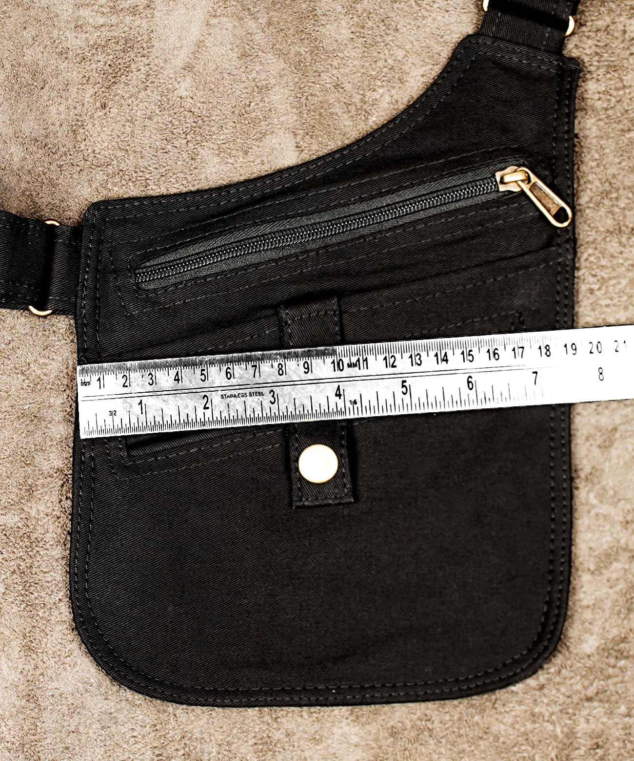 Black utility harness bag made of cotton with zip and slip pockets