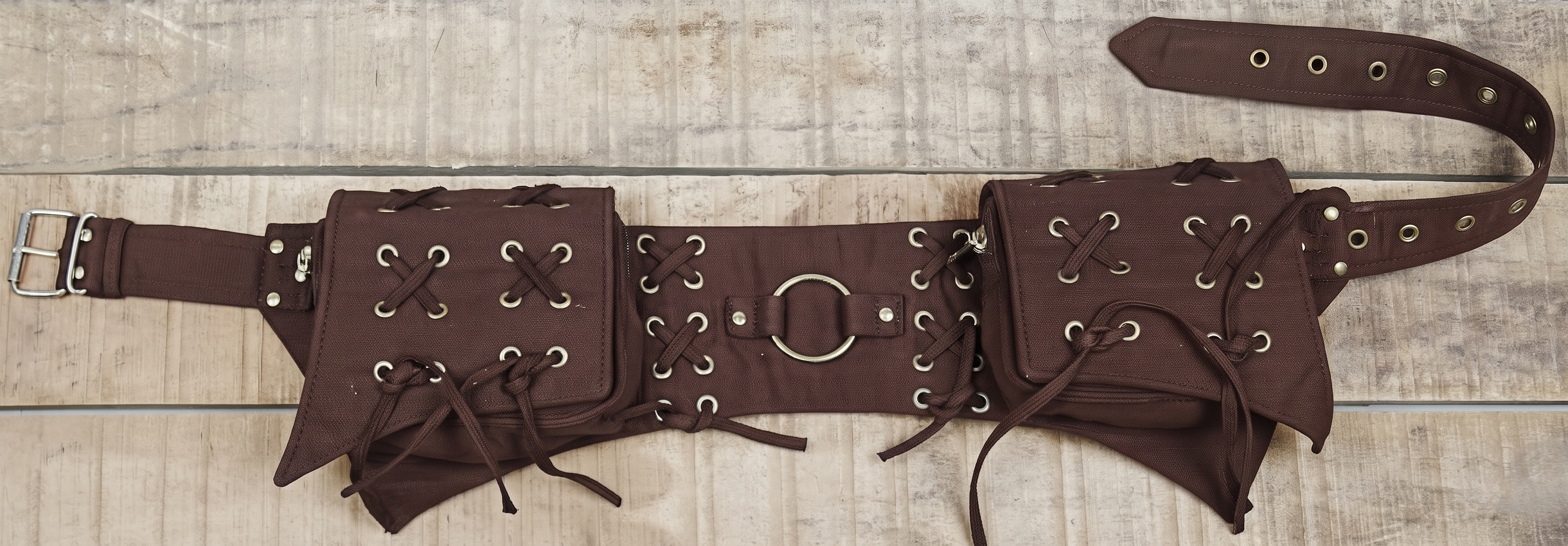 Punk style black cotton utility belt with silver eyelet rows