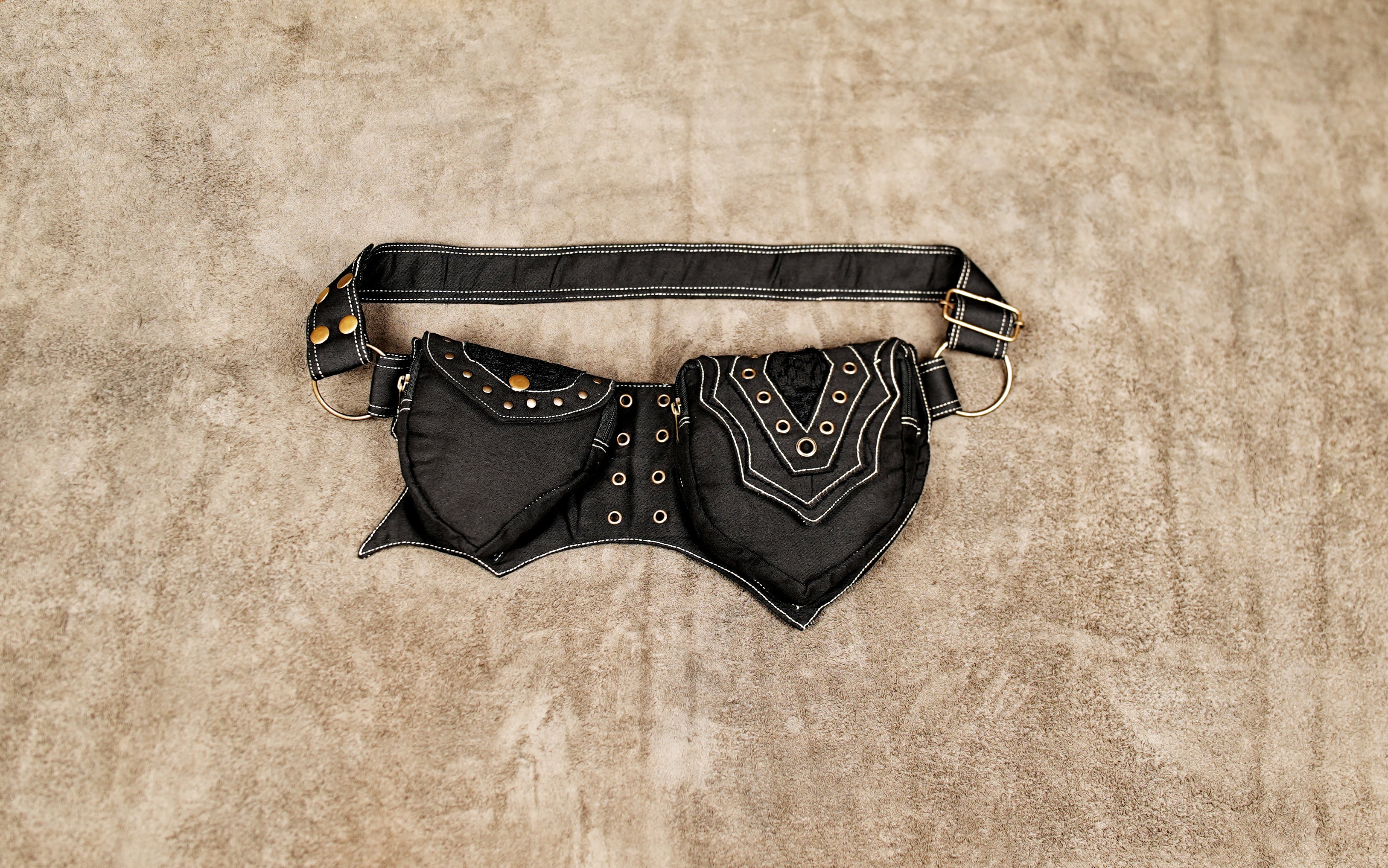 Black cotton utility waist belt with two pockets and brass rivets