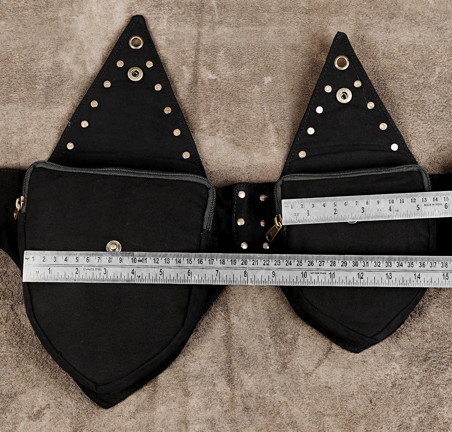 Black studded hip belt with snap fasteners and side zippers