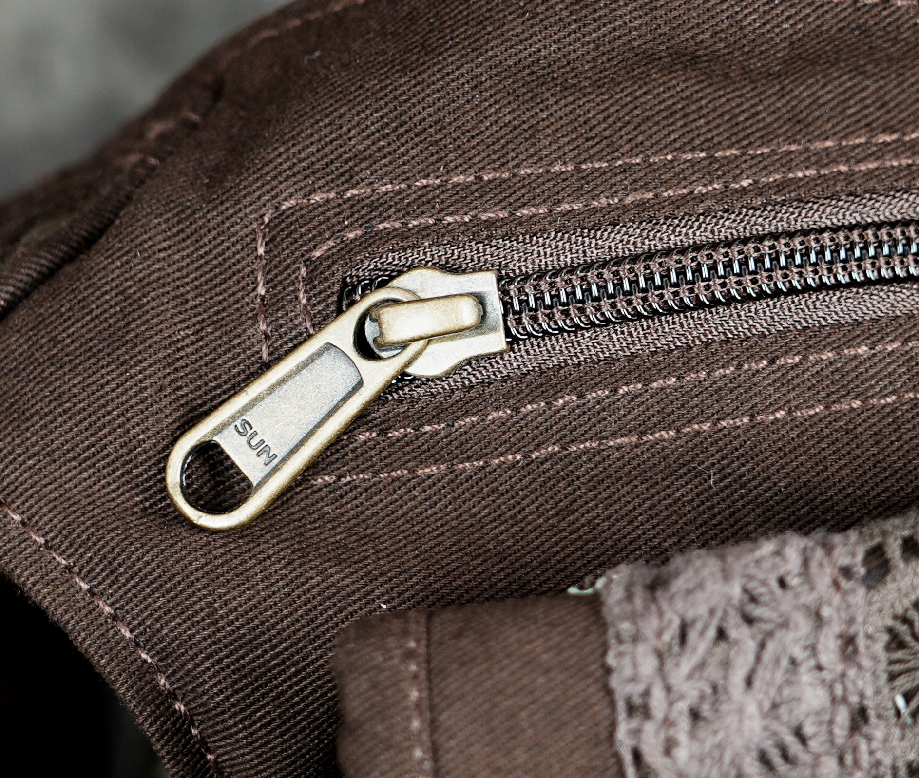 Brown cotton utility pouch with adjustable thigh strap