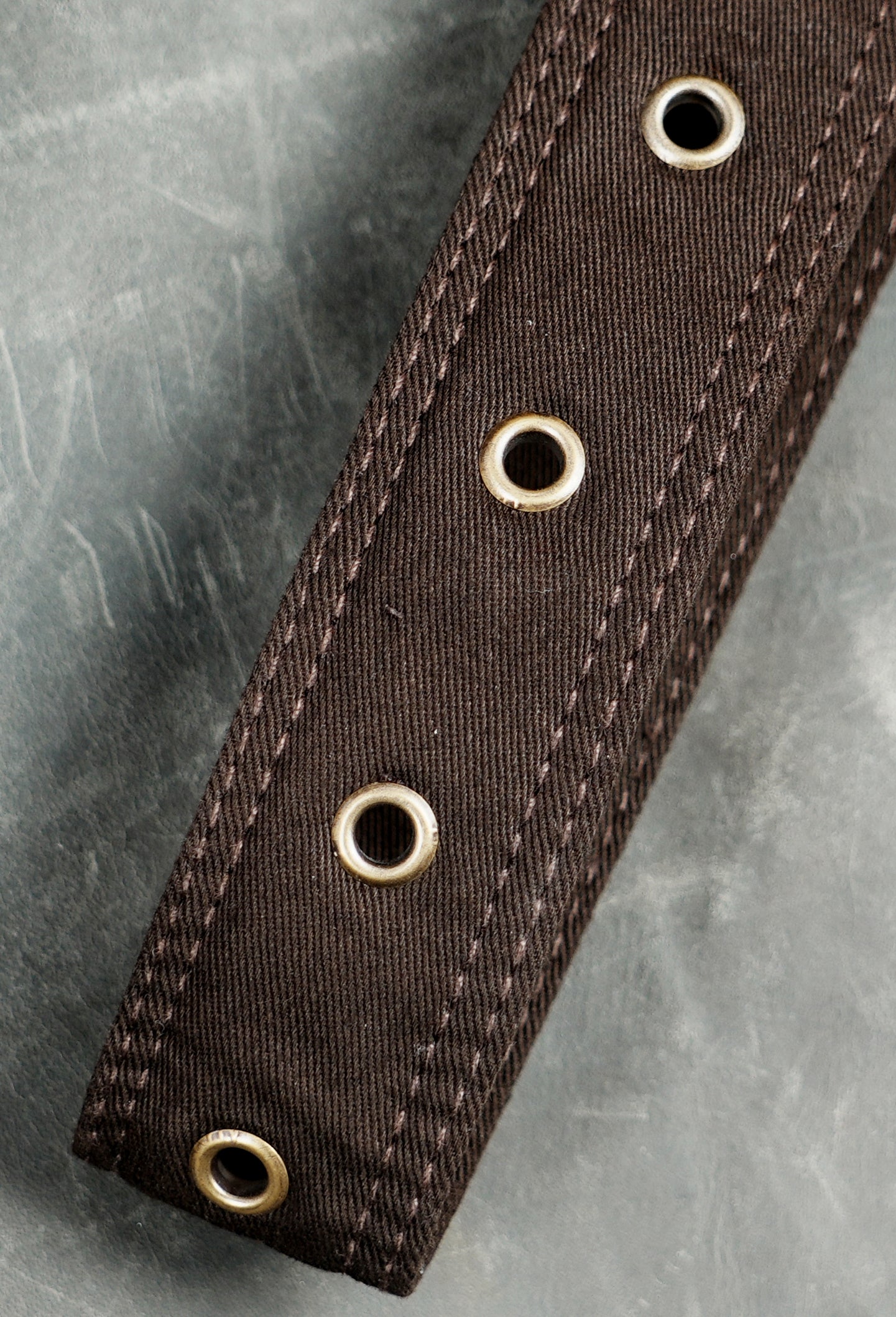 Brown cotton hip pouch with adjustable leg strap