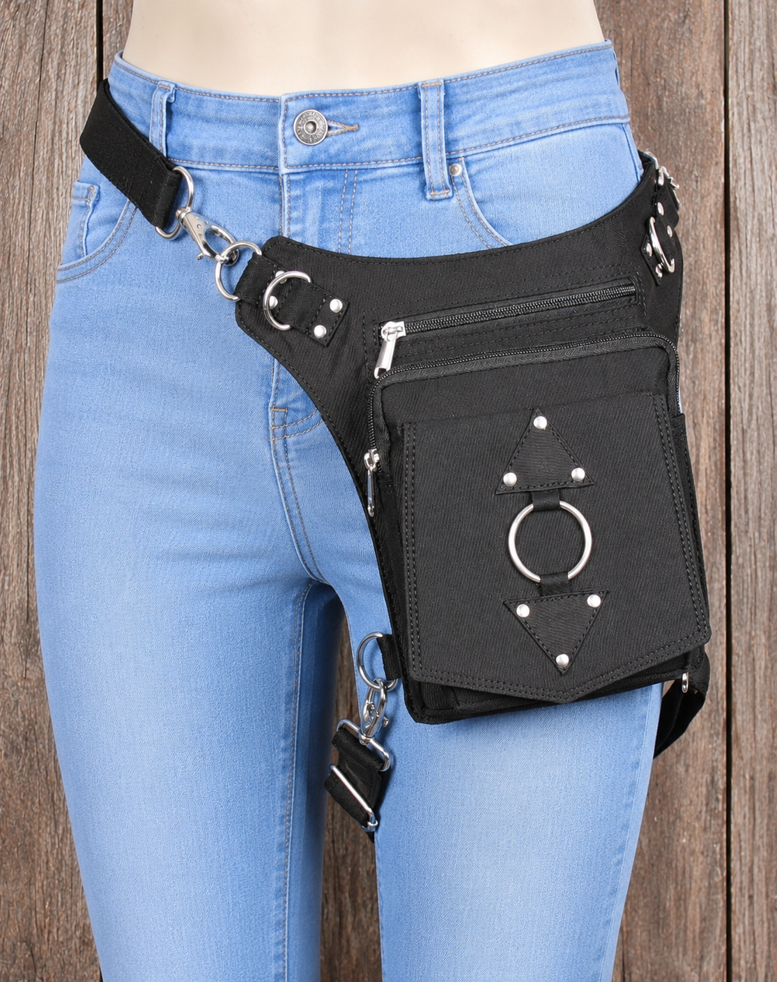 Black cotton hip bag with detachable thigh strap and utility compartments