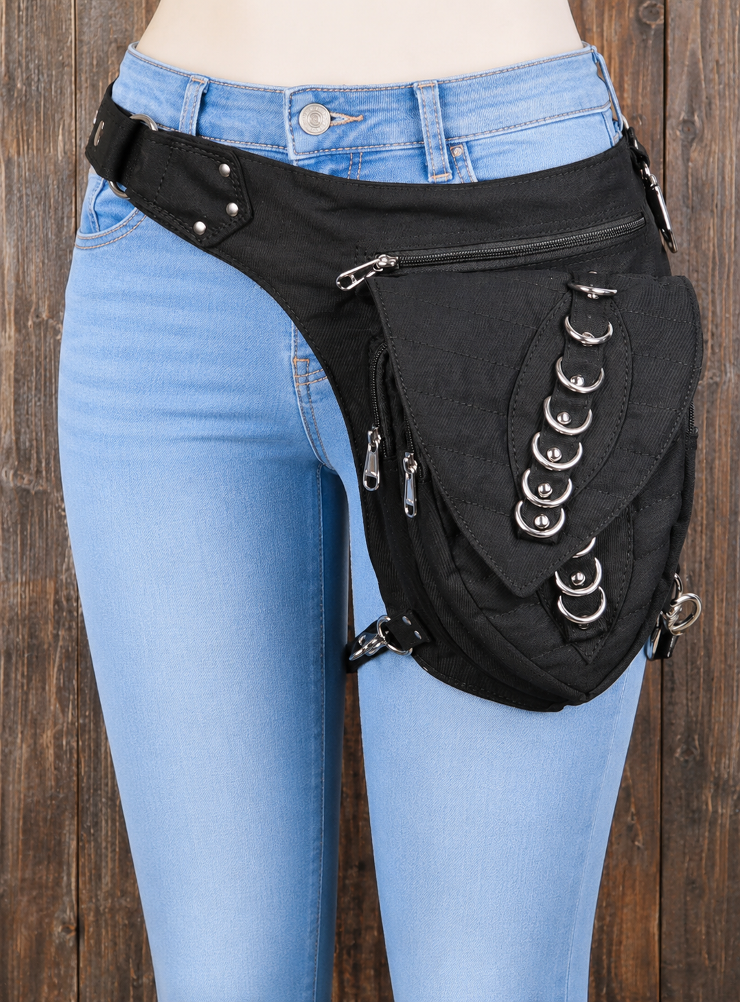 Black cotton waist belt bag with adjustable thigh strap support.