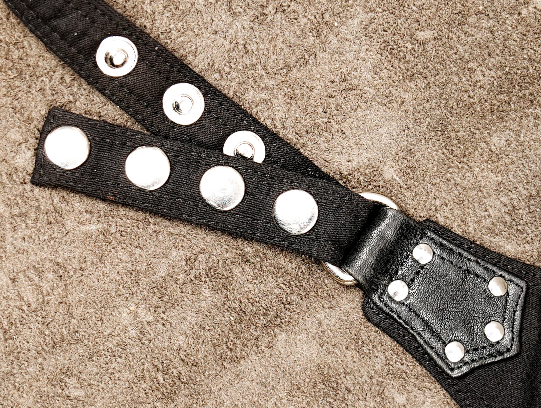 Goth-inspired black waist and leg harness bag for rave and festival wear.