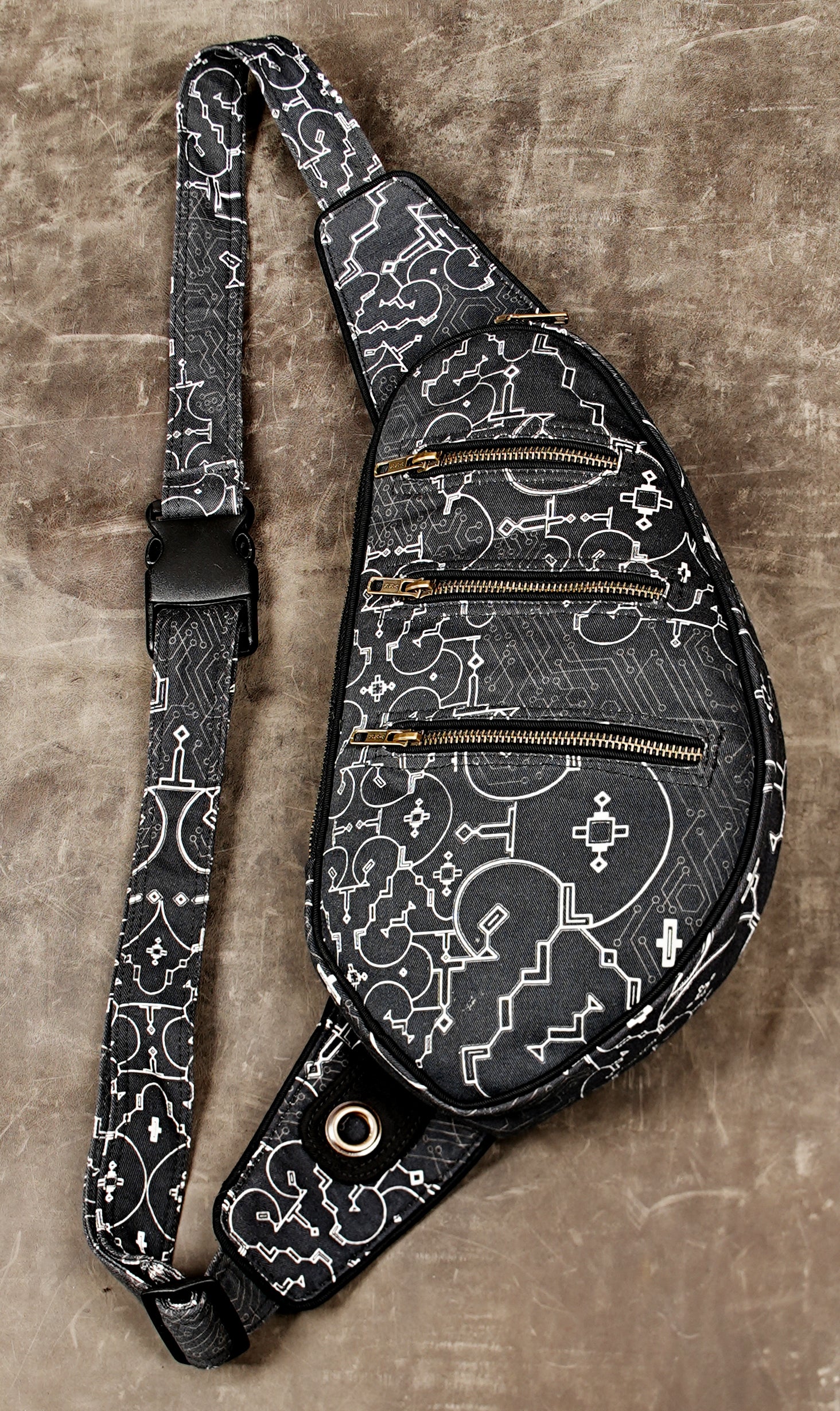 Black and white cotton fanny pack with Shipibo-style pattern and adjustable strap