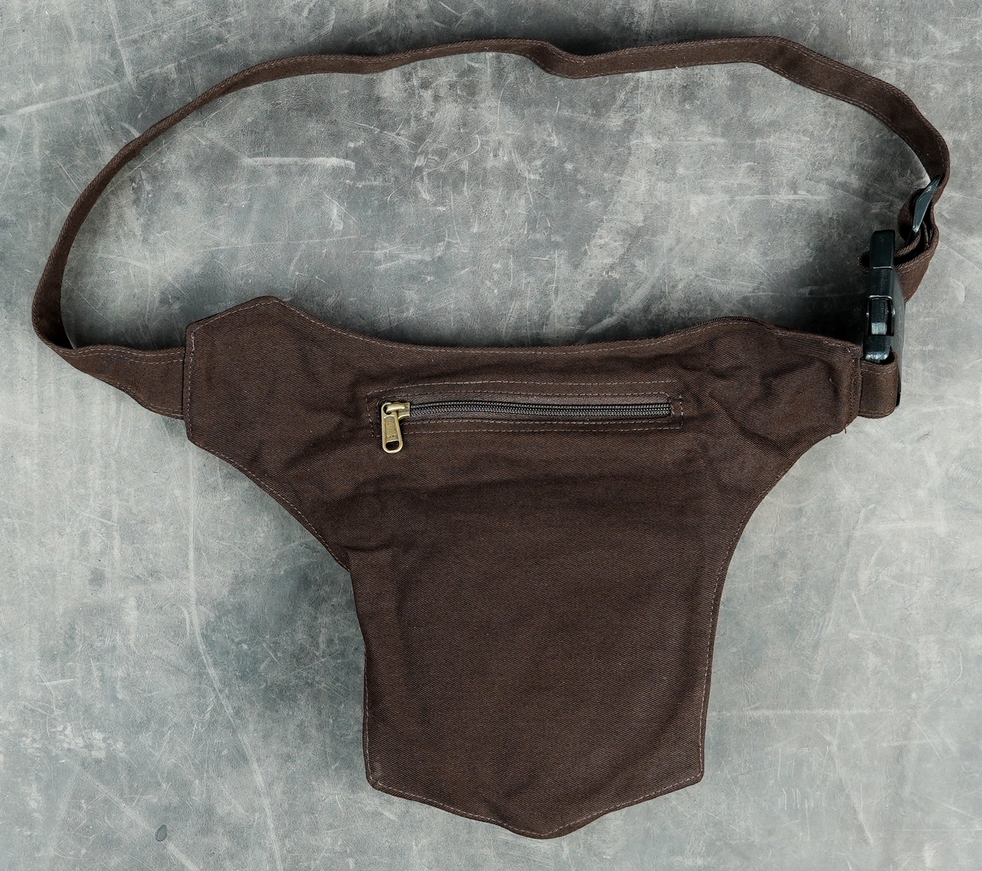 Brown and black cotton waist pack with brass button and layered pocket detail