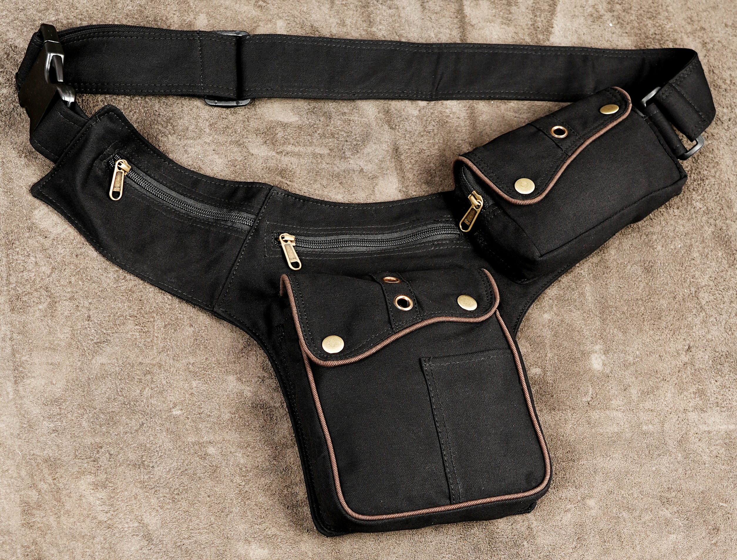 Black canvas utility belt bag with adjustable strap and side pouch