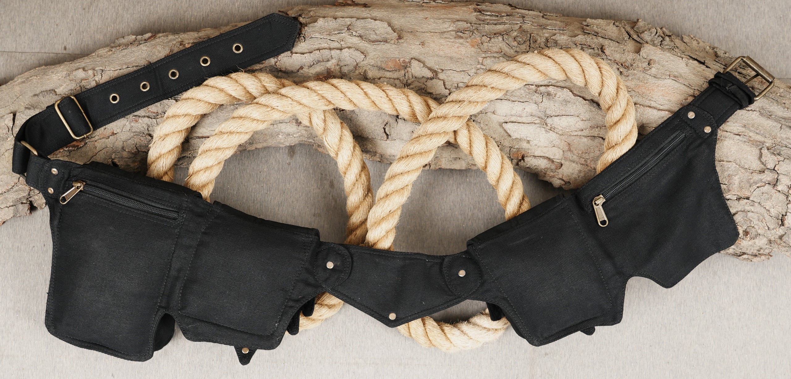 Secure travel waist pouch belt with 4 discrete, organizing pouches and metal buckles.