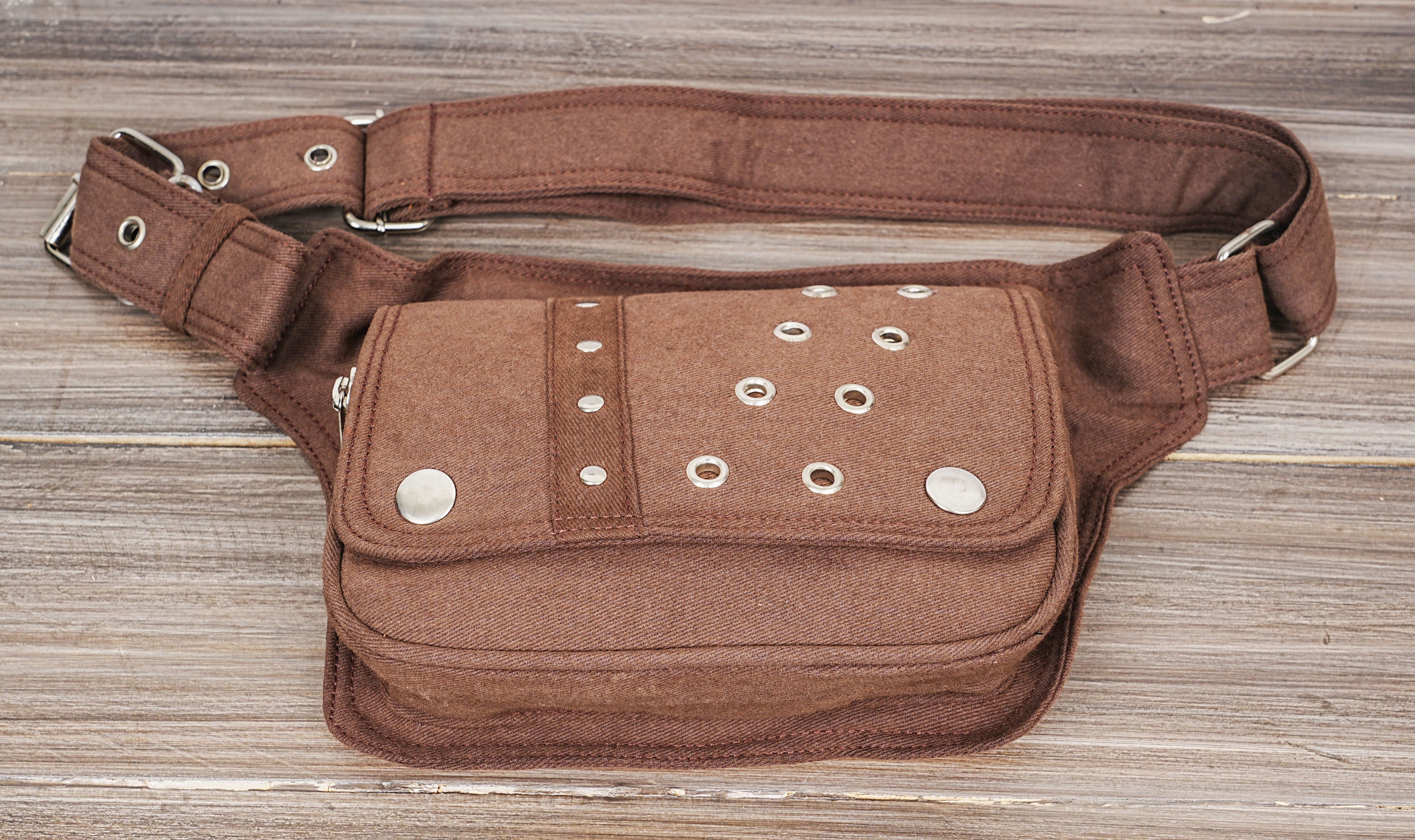 Stylish and durable studded cotton canvas hip pouch.