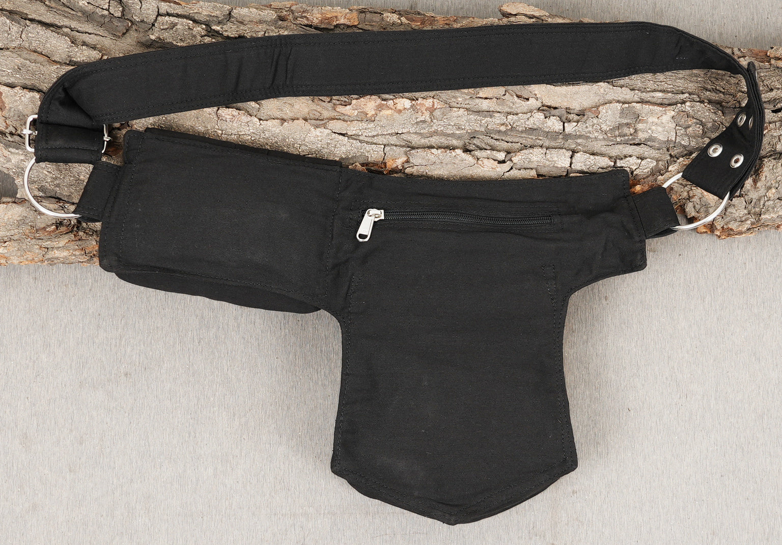 Strong cotton canvas fanny pack with adjustable strap and twin secure pockets.