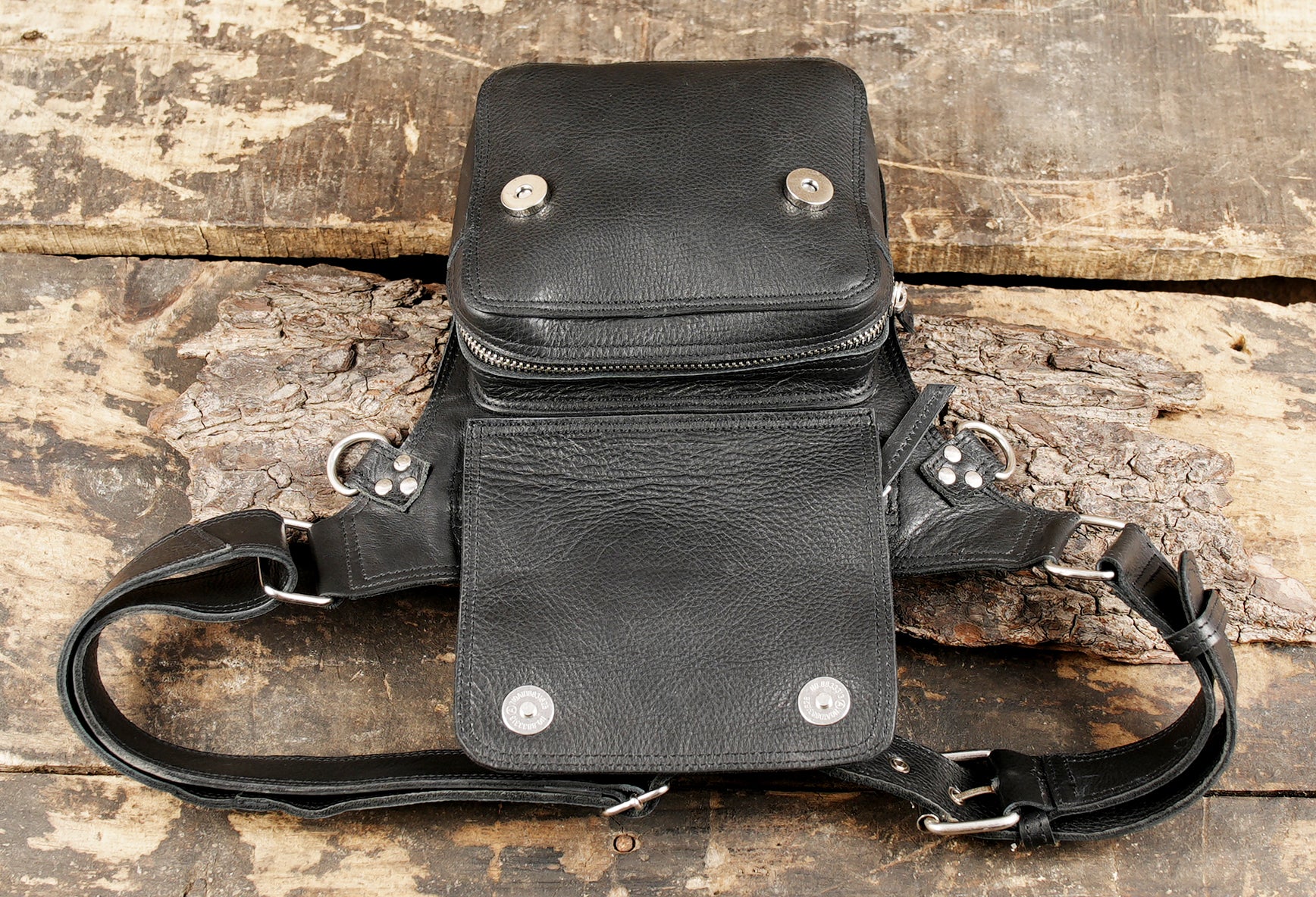 Leather utility belt with zipper pouch and rings