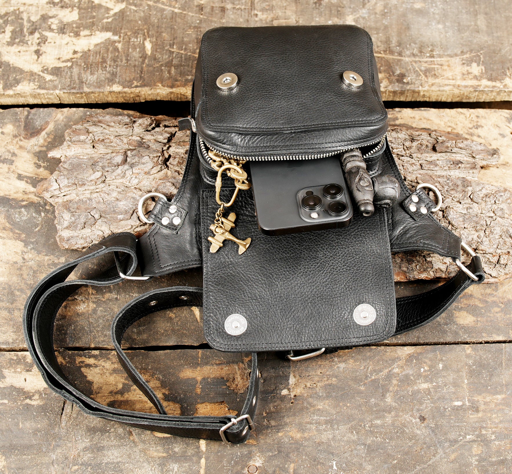 Adjustable black leather waist belt for hands-free carry