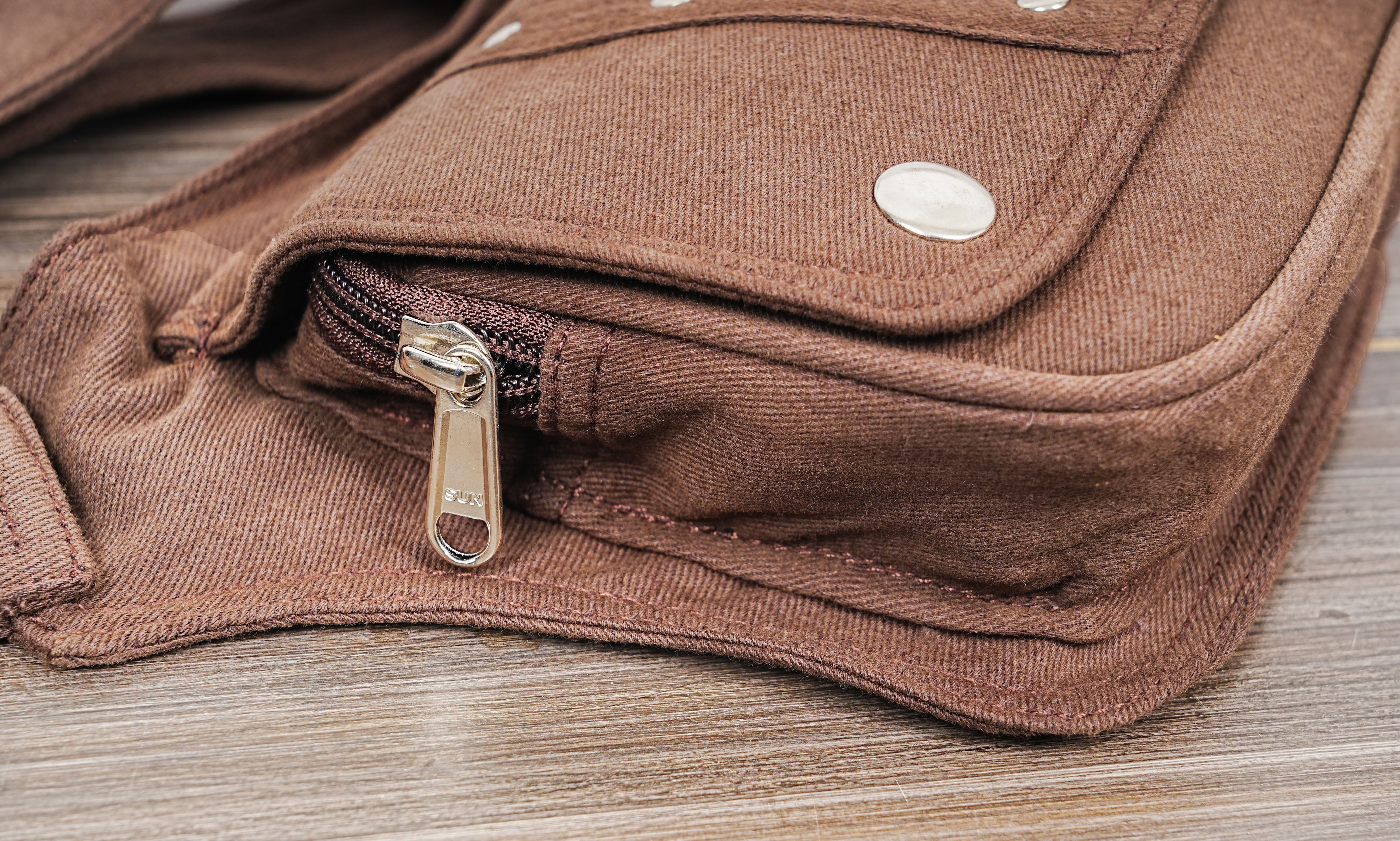 Compact fanny pack made from sturdy brown cotton canvas.