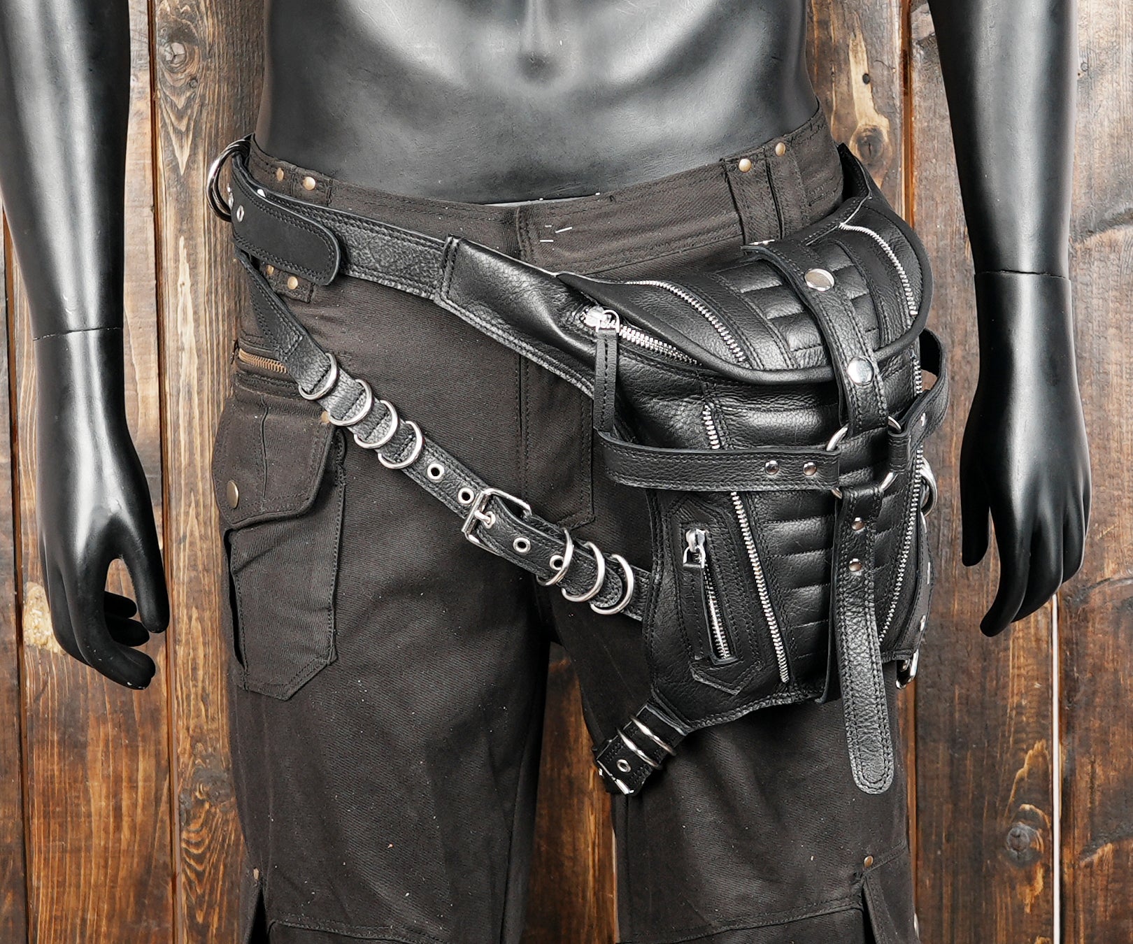 Handcrafted black leather belt pouch ideal for carrying essentials.