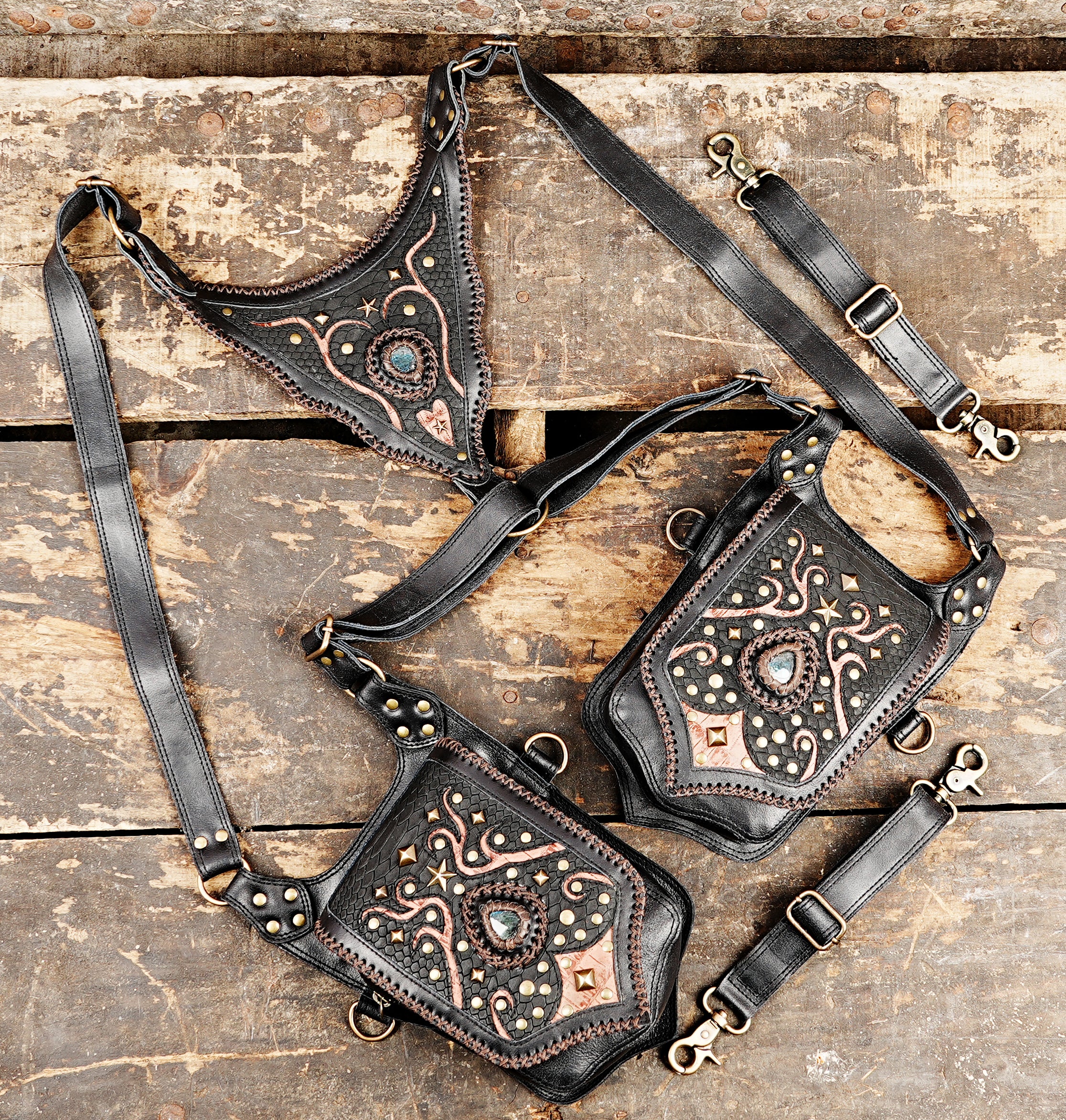 “Premium black leather utility holster with artistic copper details and dual pockets”