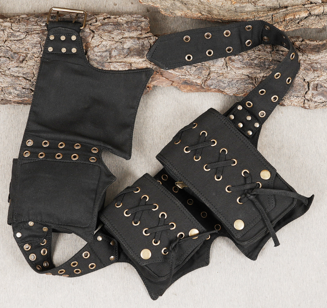 Rugged black hip belt with metal grommets for festival wear