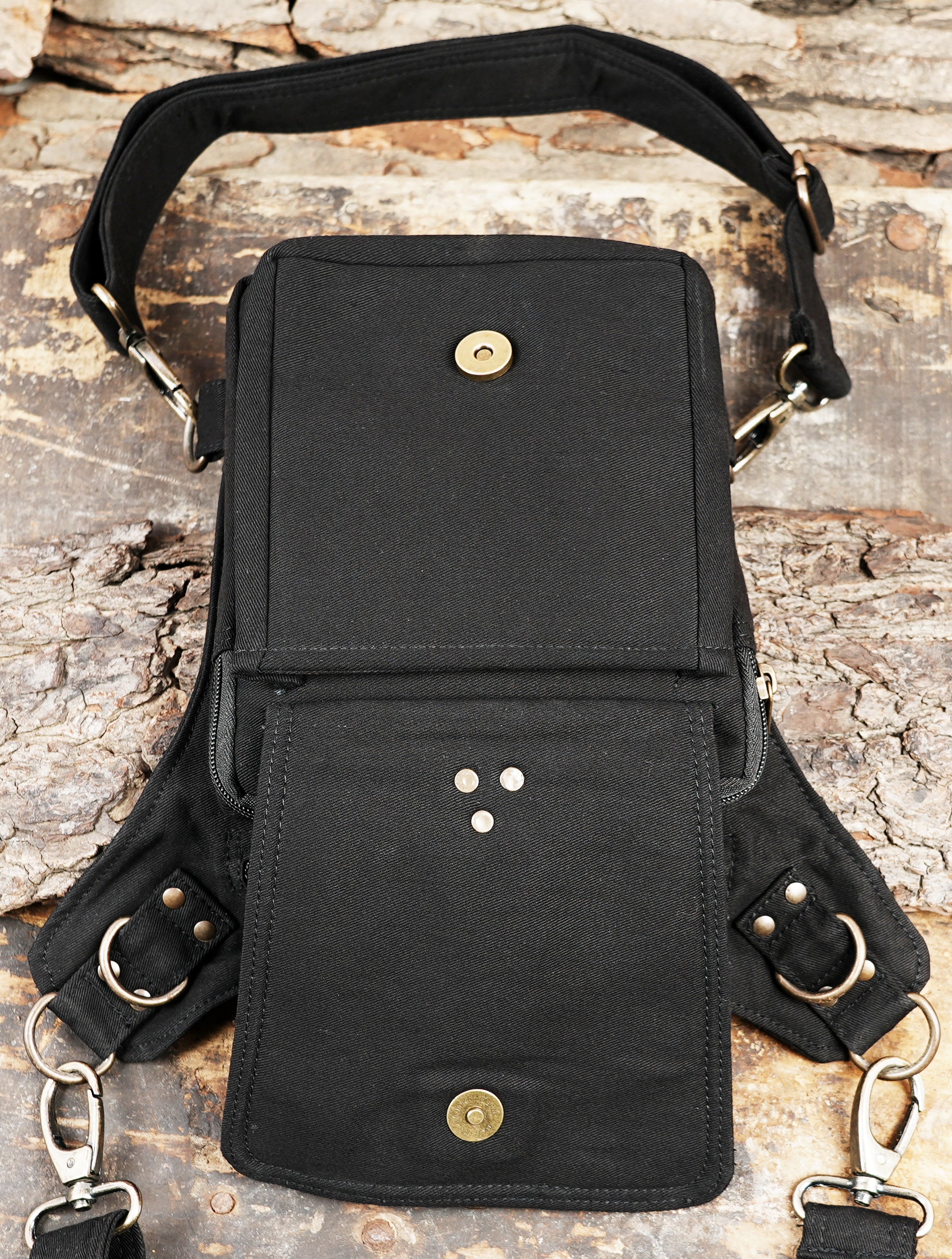Techwear style thigh bag with silver clasp hooks