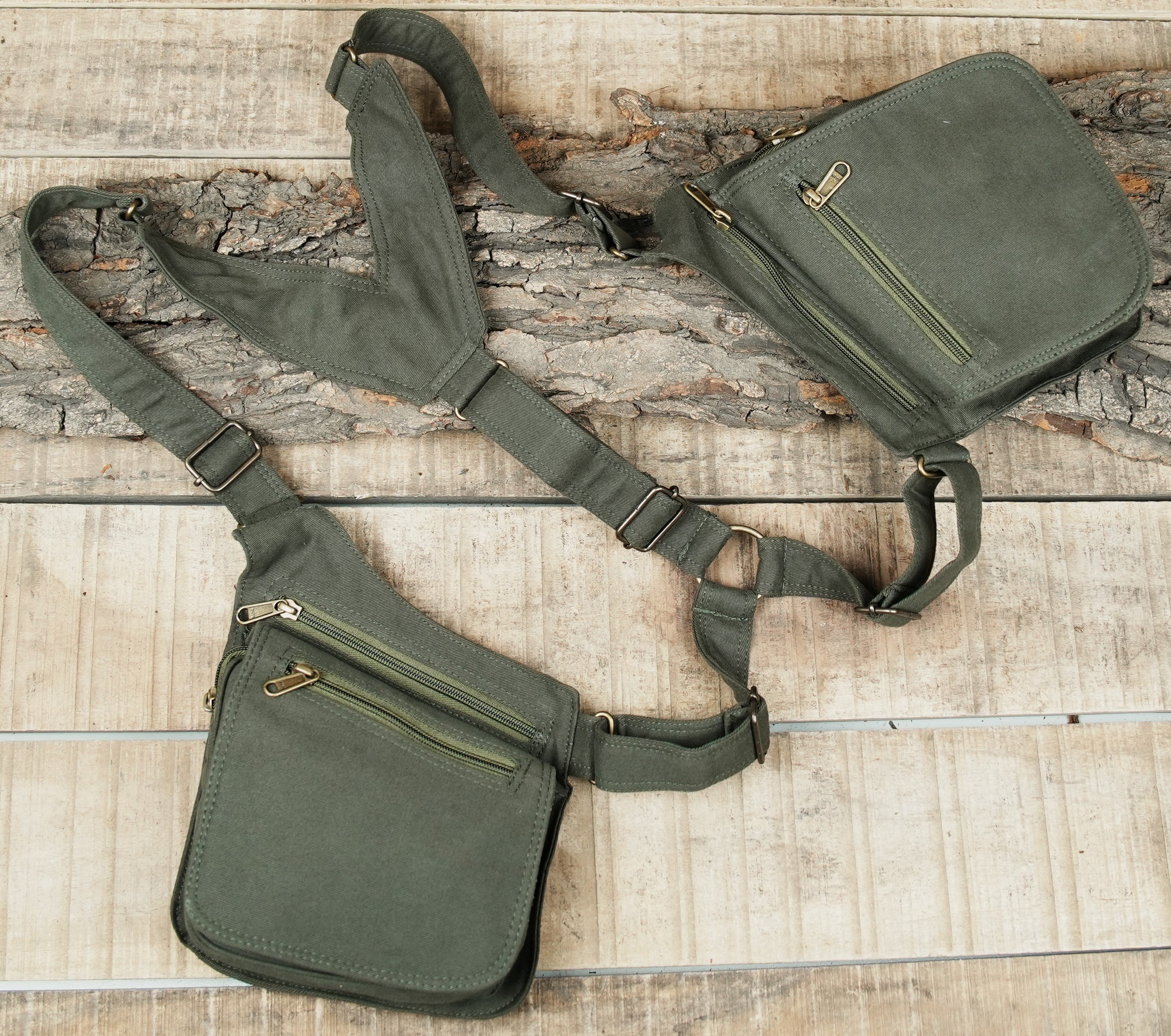 Industrial punk style olive canvas shoulder bag with secure zipper pockets