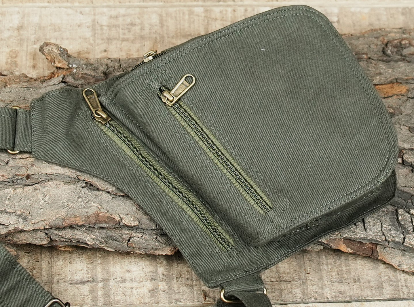 Adjustable double shoulder bag with secure zippered compartments and durable fabric