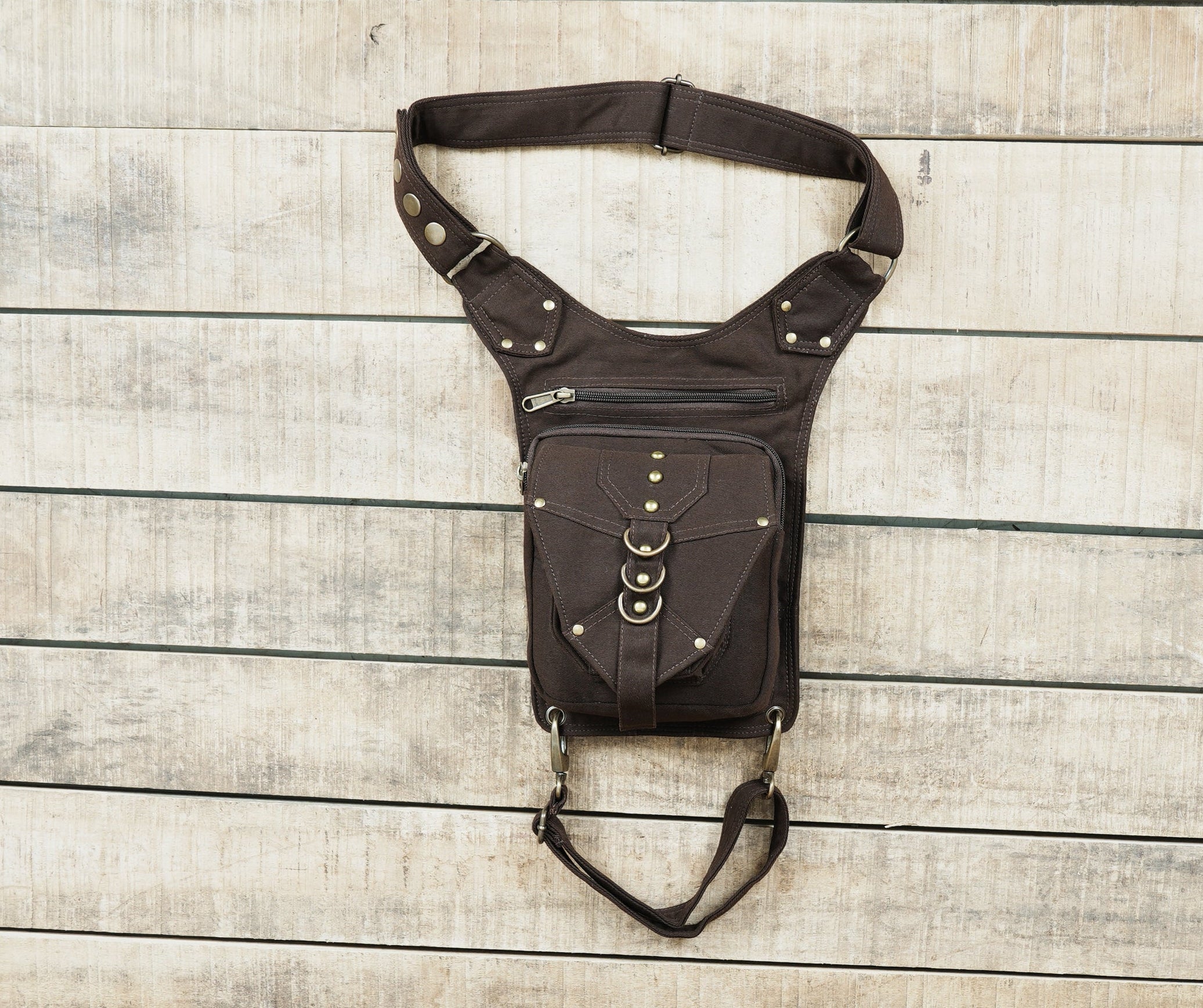 Handmade drop leg utility belt bag for outdoor travel, concerts, and music festivals.