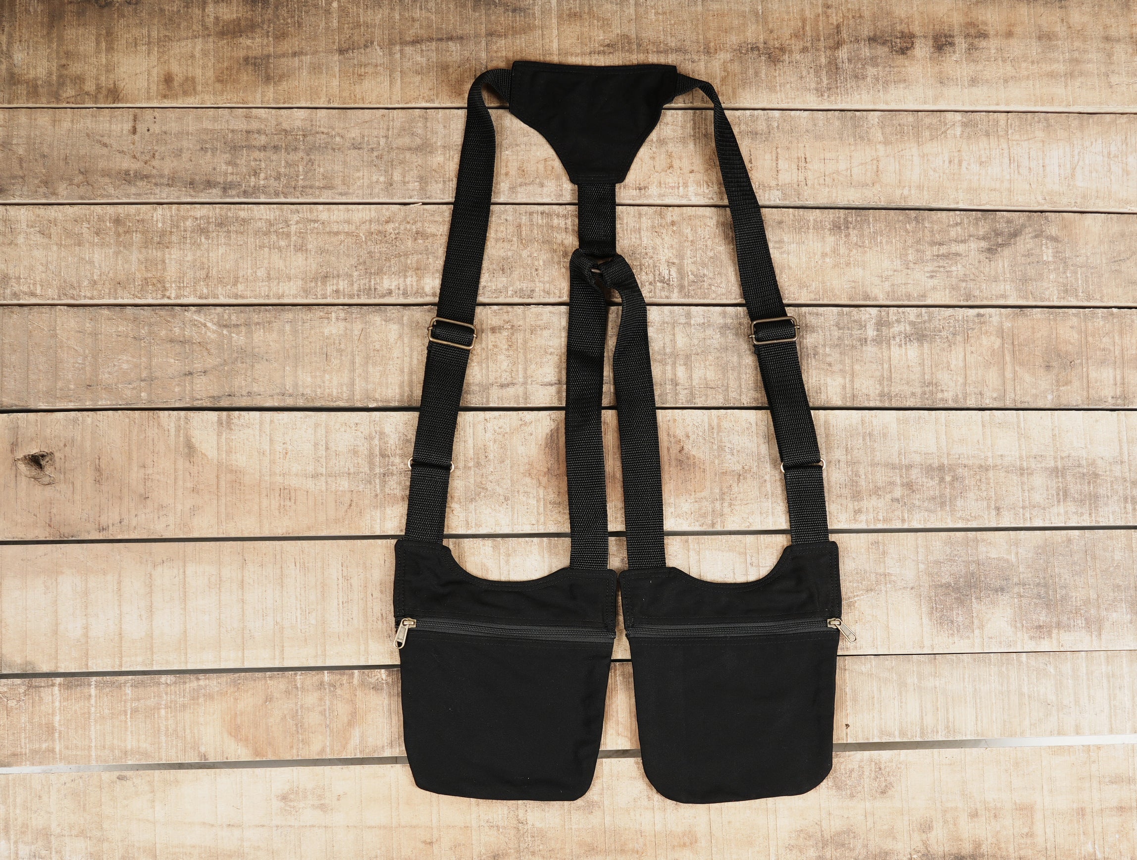 Black cotton chest holster with two zippered pouches