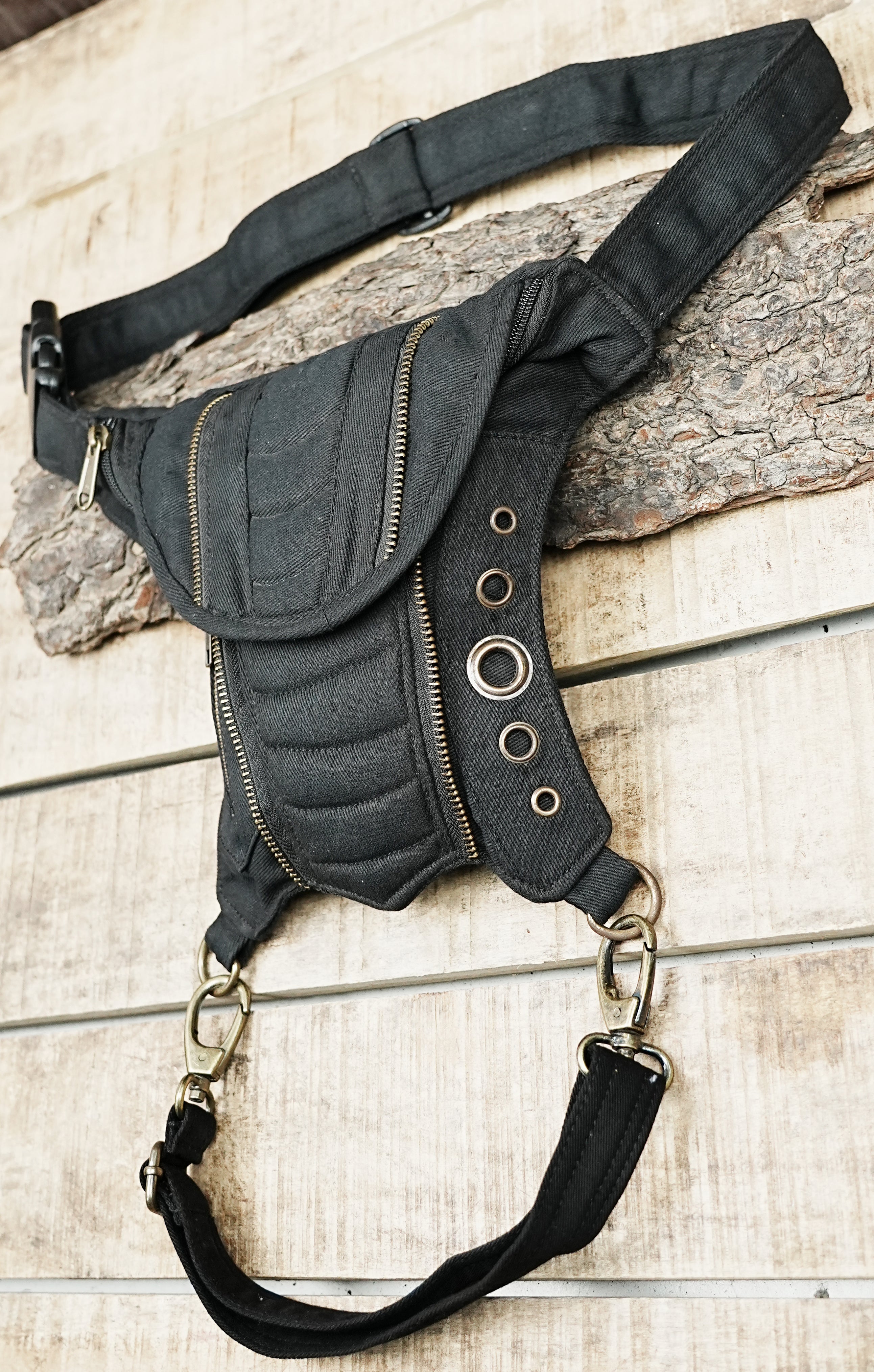 Steampunk fashion pouch with grommet detailing