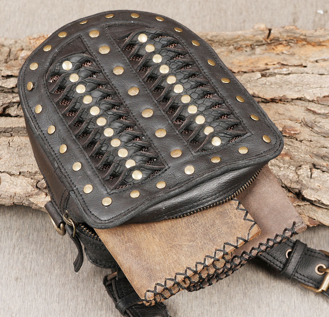 Gothic style leather shoulder holster with metal studs