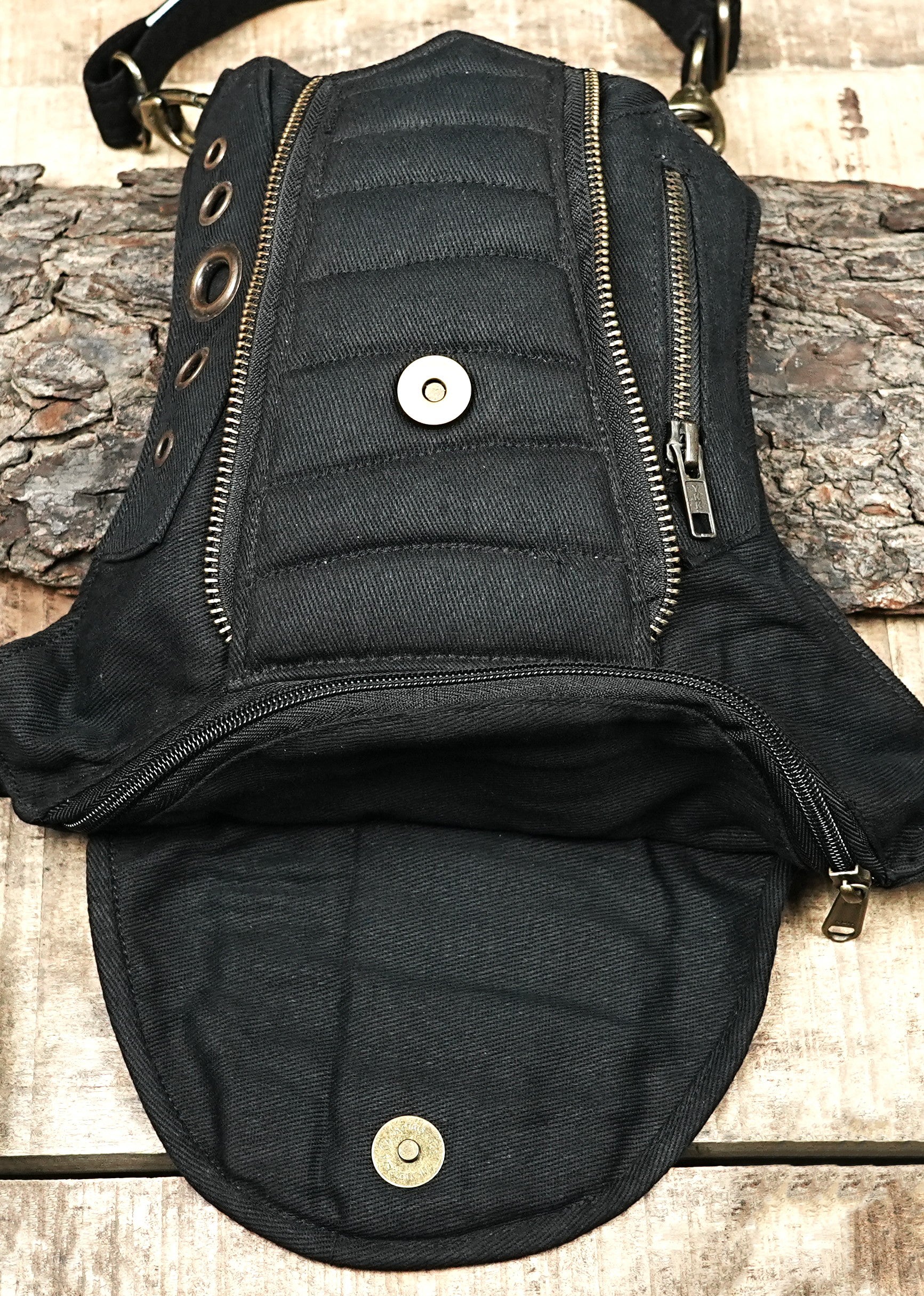 Adjustable waist to thigh strap bag in black canvas