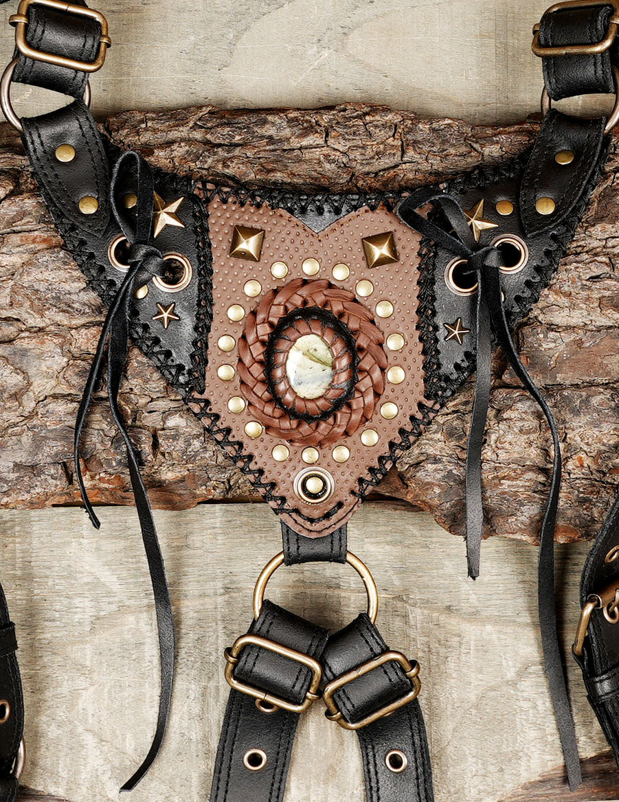 Steampunk style leather holster with brass studs and braided edges