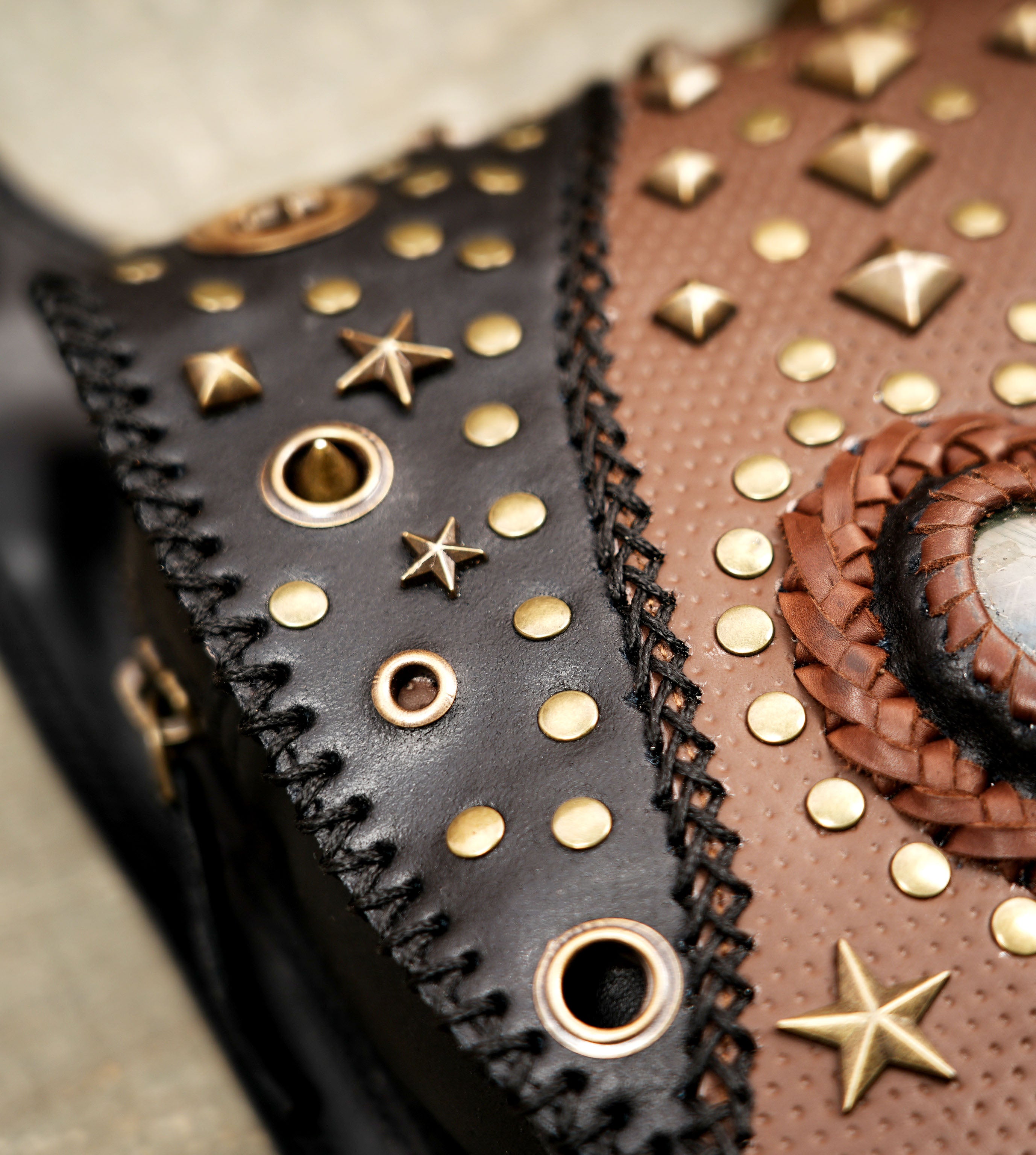 Adjustable leather shoulder holster with unique gemstone design