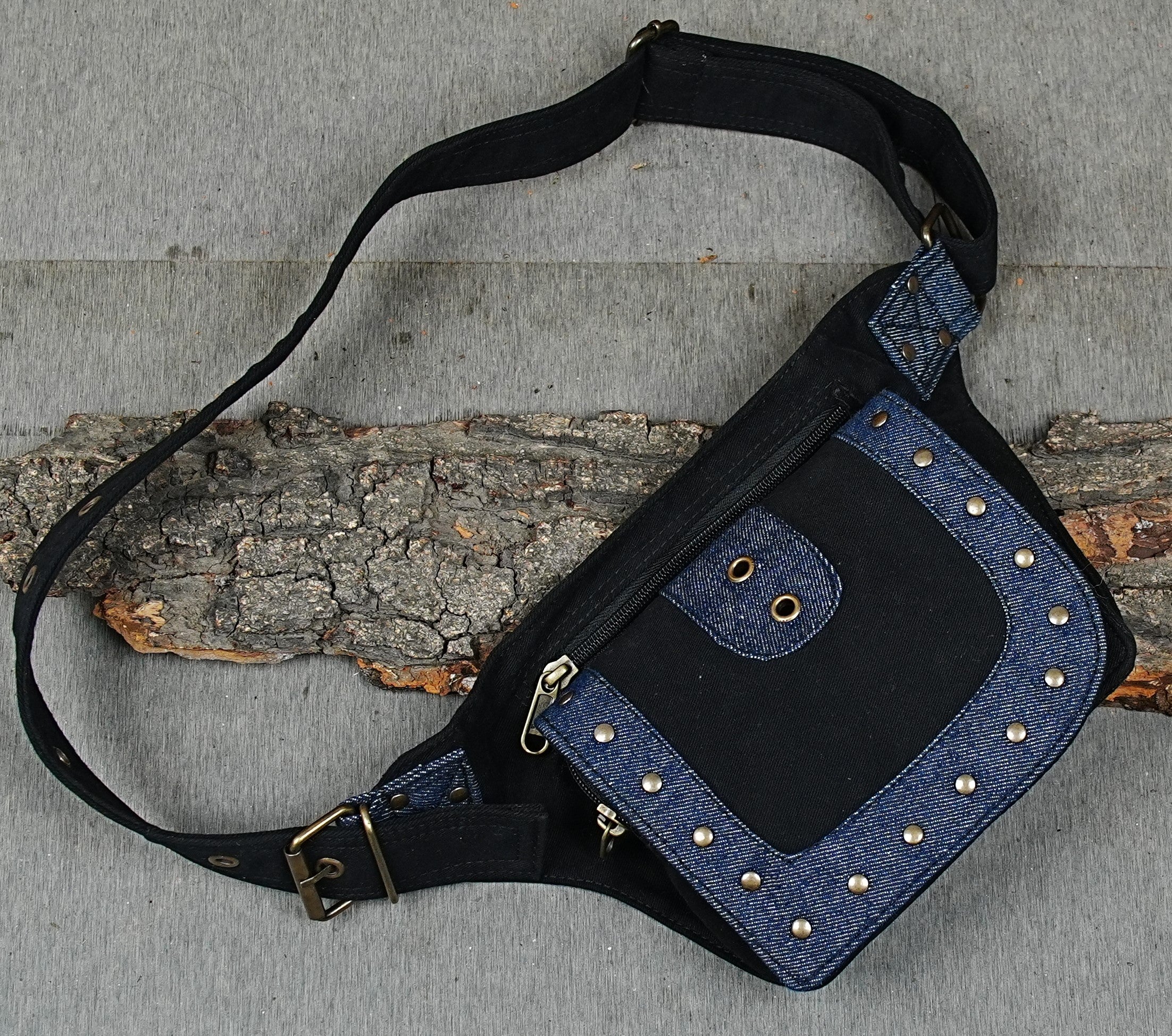 Hands-free travel money pouch in black canvas and denim with metal hardware