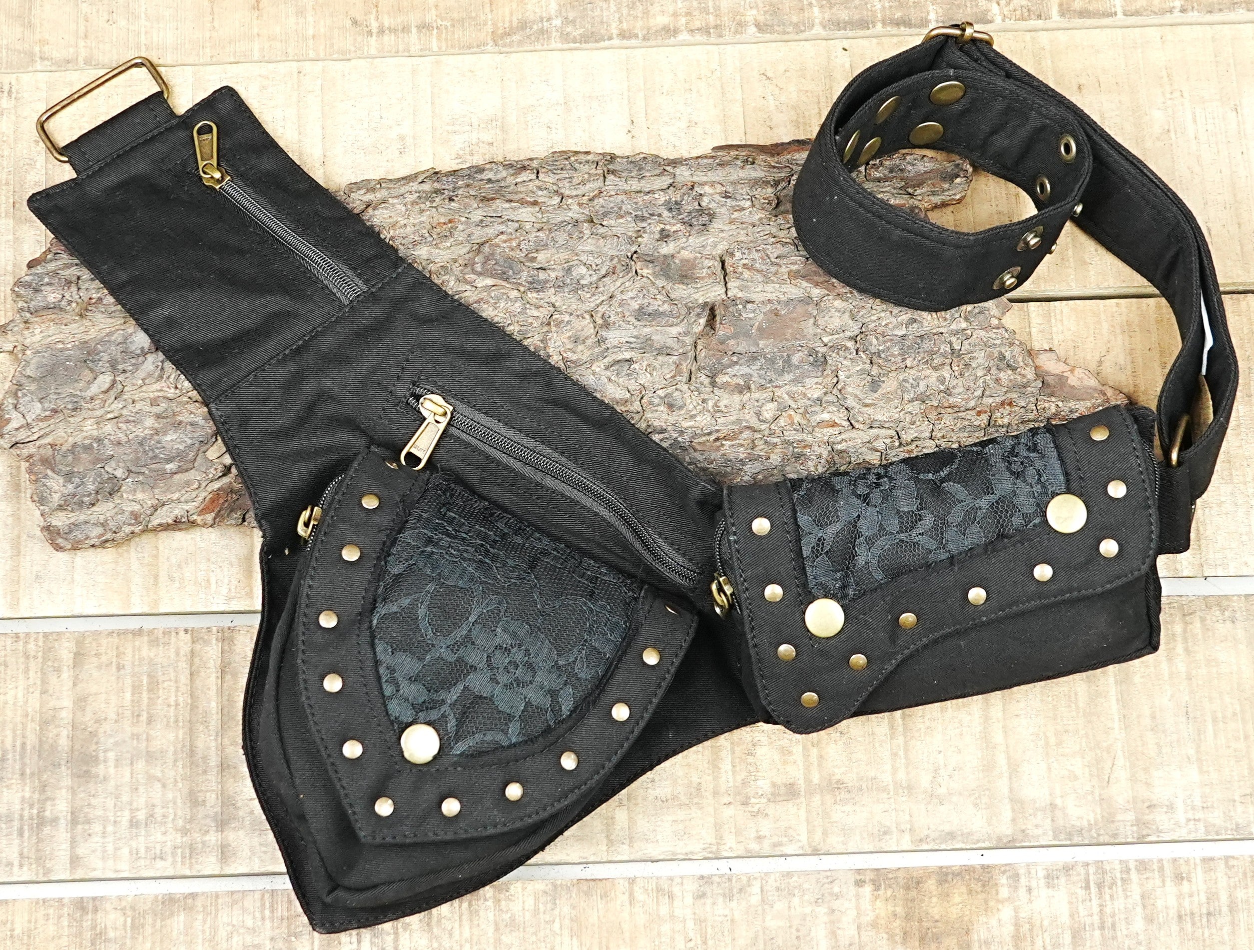 Unisex festival waist pack with brass rings and pointed utility pockets
