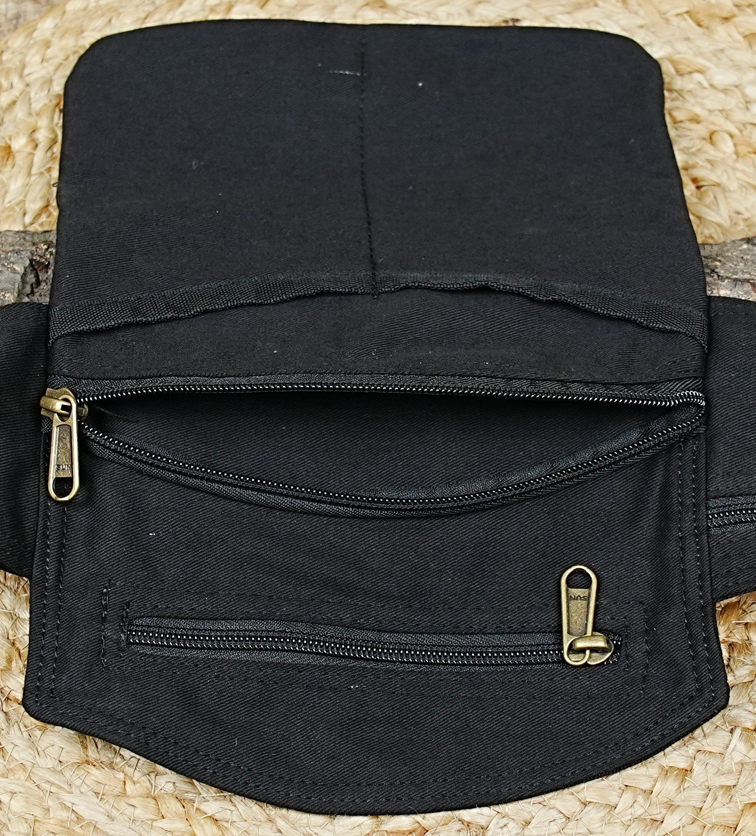 Travel bum bag in black canvas with secure zip compartments
