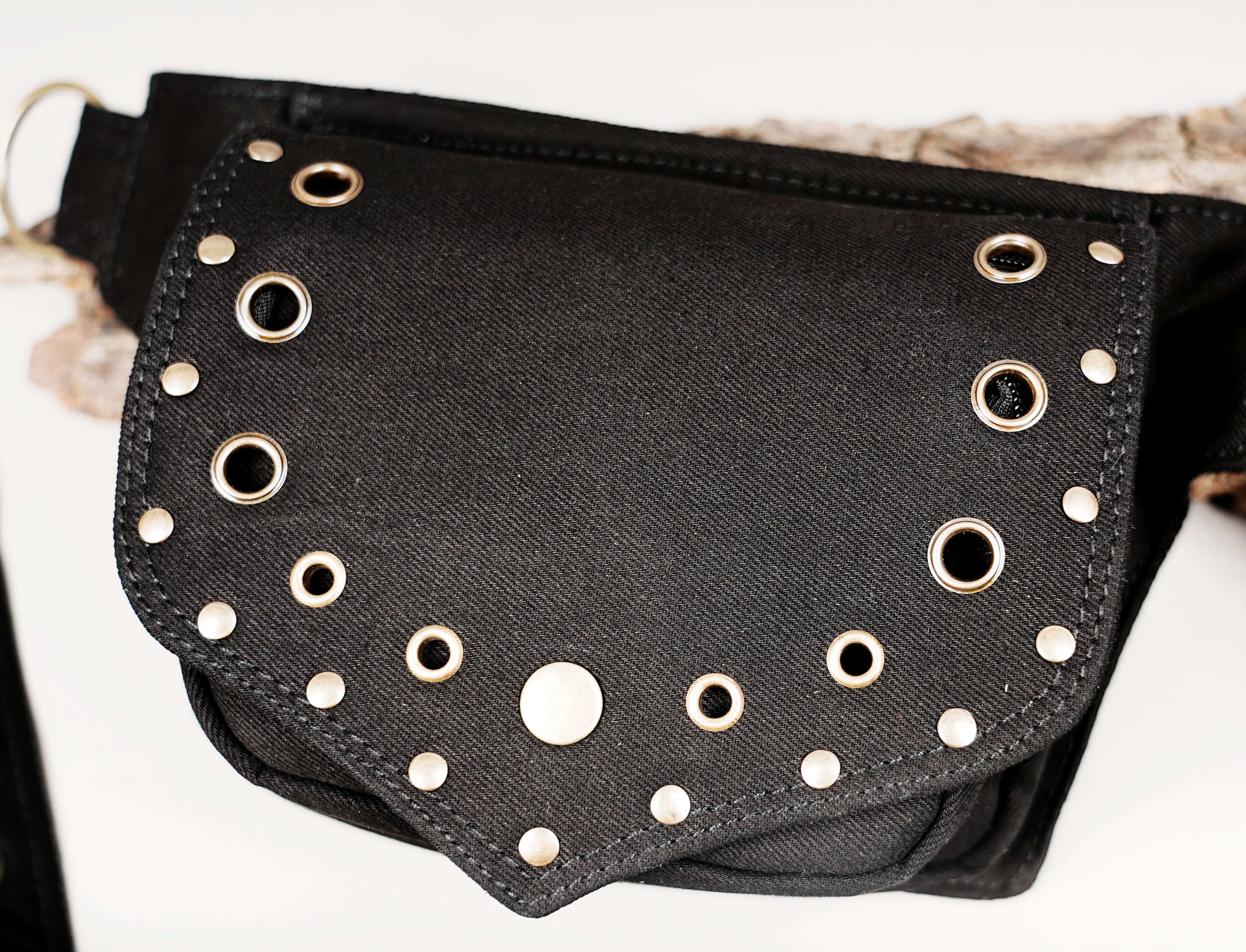 Studded fanny pack with grommet trim, festival ready